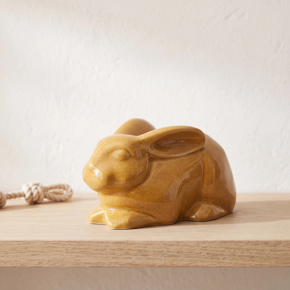 Rabbit-Urn-for-Ashes-in-Amber-pet_soft_toy_shelf