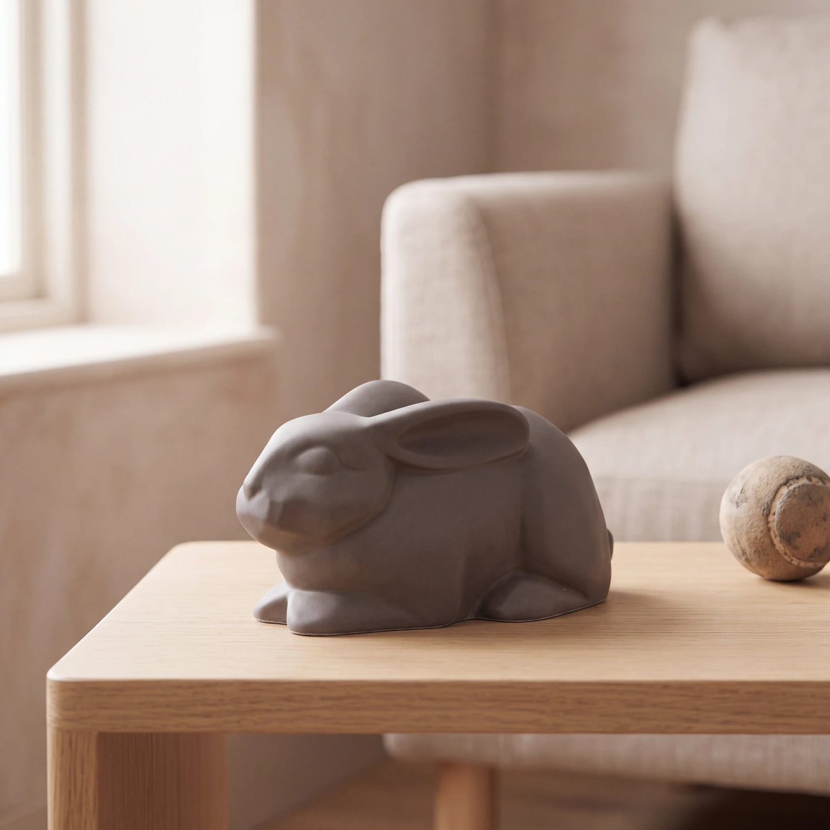 Rabbit-Urn-for-Ashes-in-Matte-Grey-pet_reading_nook