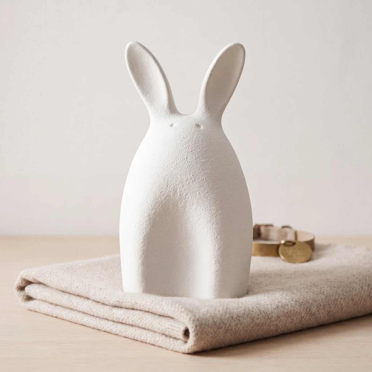 Rabbit-Urn-for-Ashes-in-White-pet_blanket_fold