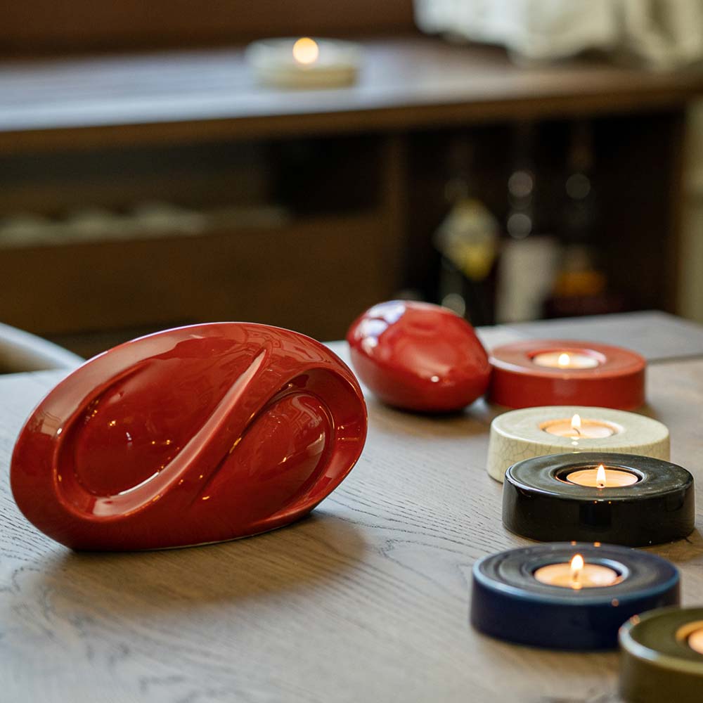 Red Infinity Urn And Caleo Candle Window