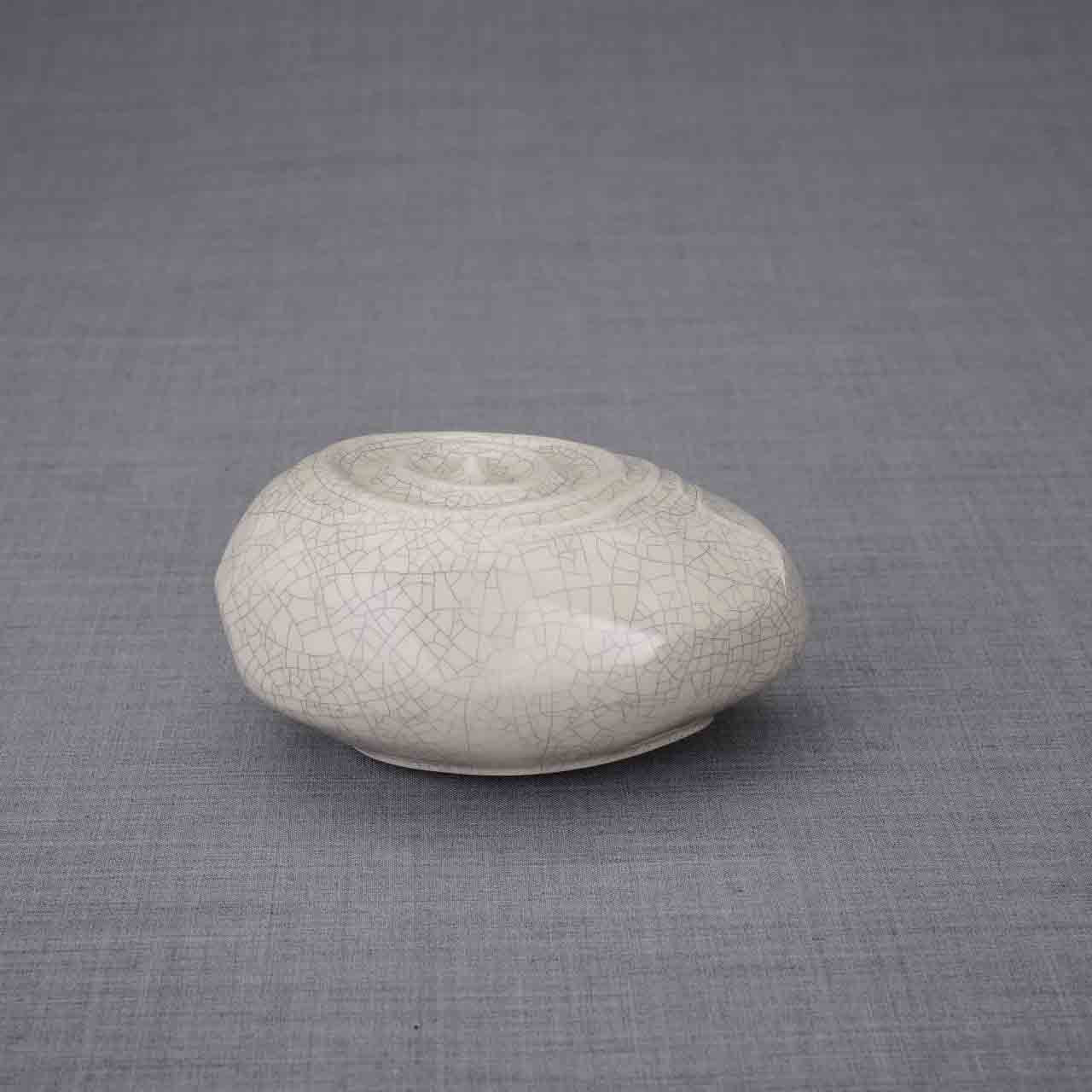 Resonance Ashes Keepsake Urn in Crackle Glaze Facing Right Dark Background