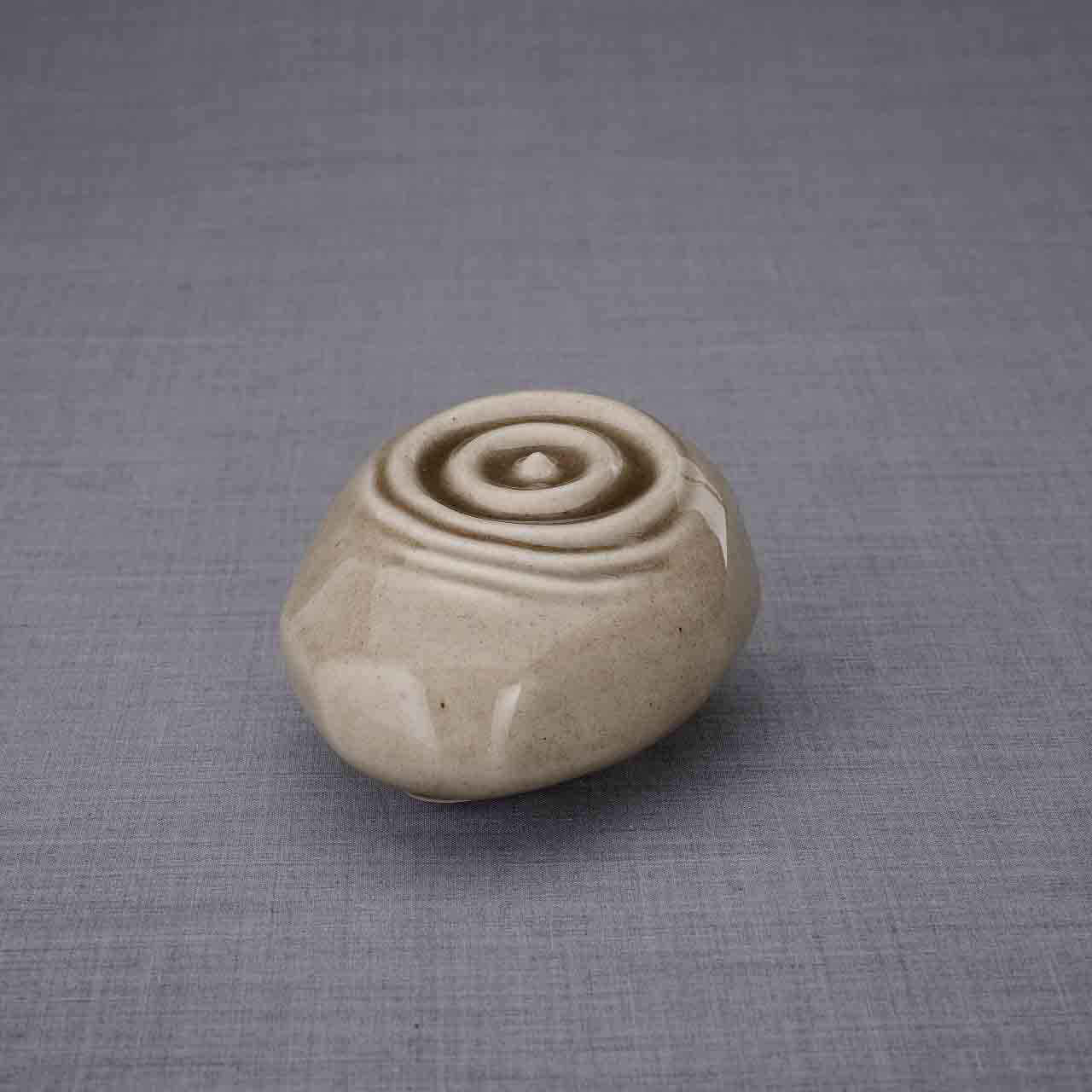 Resonance Ashes Keepsake Urn in Dark Beige Turned Left Dark Background