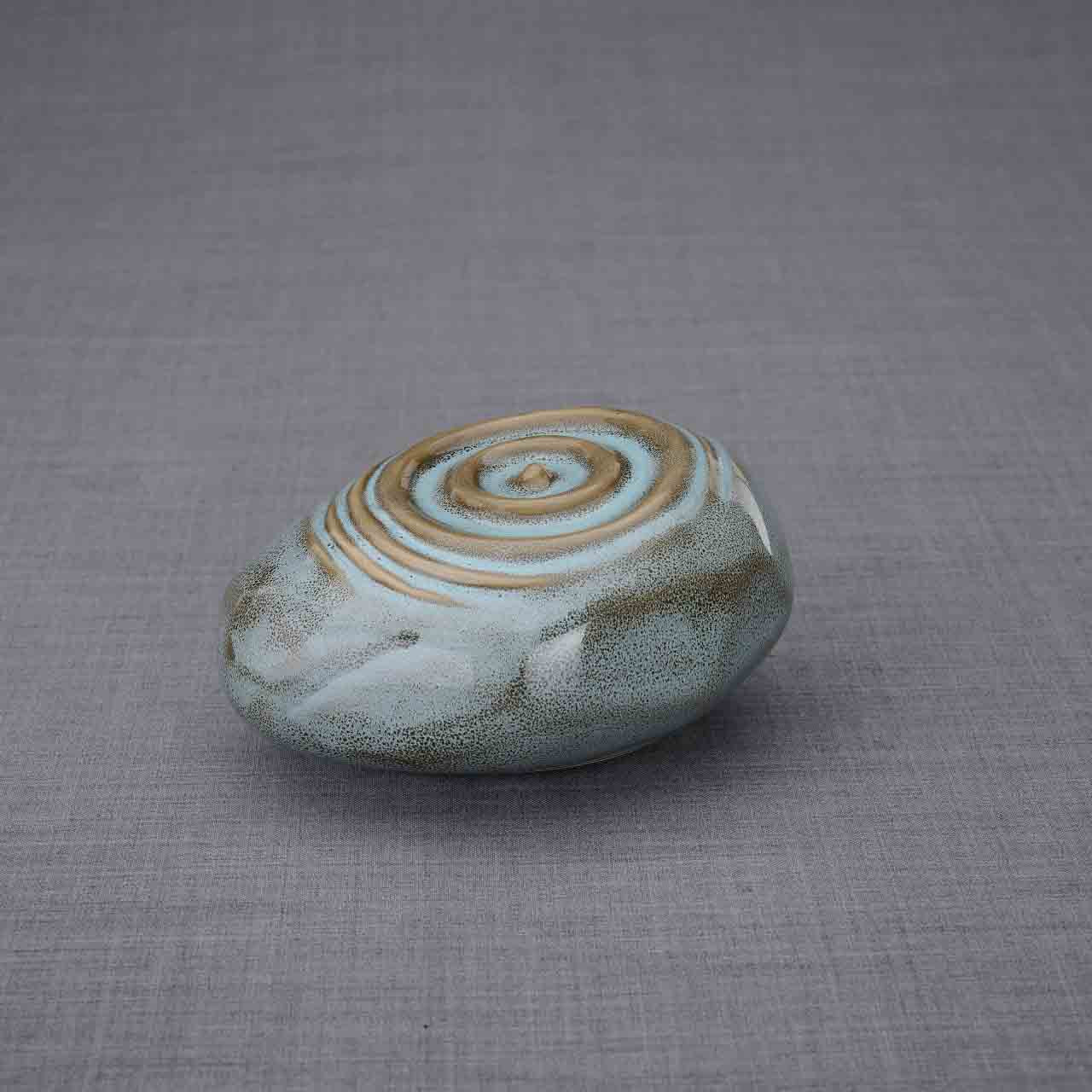 Resonance Ashes Keepsake Urn in Oily Green Dark Background