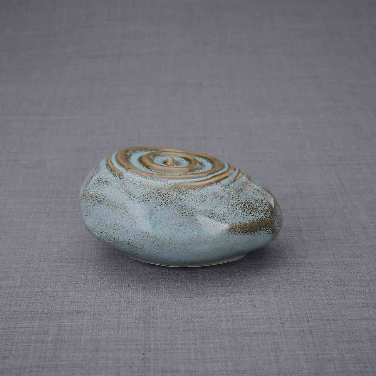 Resonance Ashes Keepsake Urn in Oily Green Turned Right Dark Background