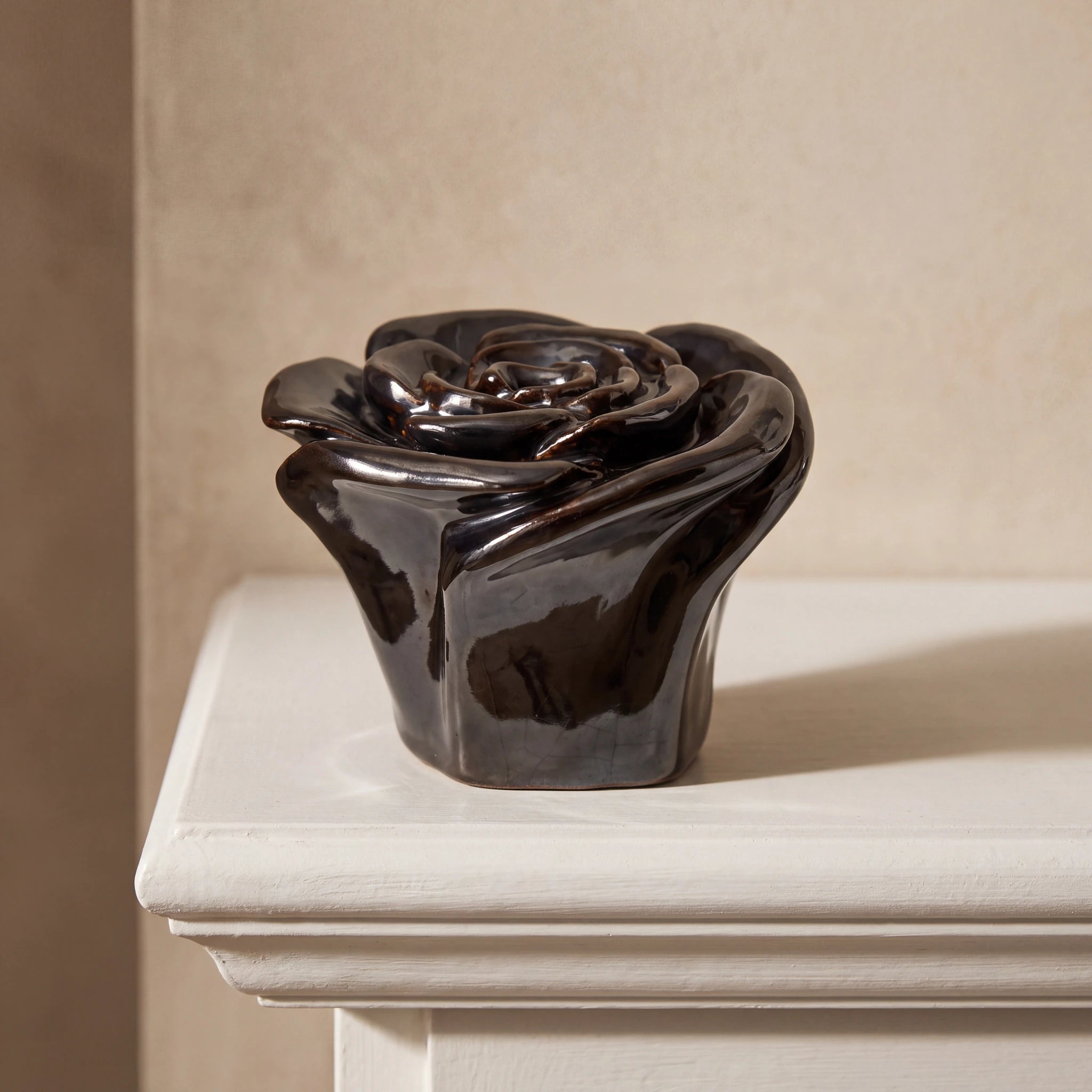Rose-Keepsake-Urn-for-Ashes-in-Black-Mantelpiece