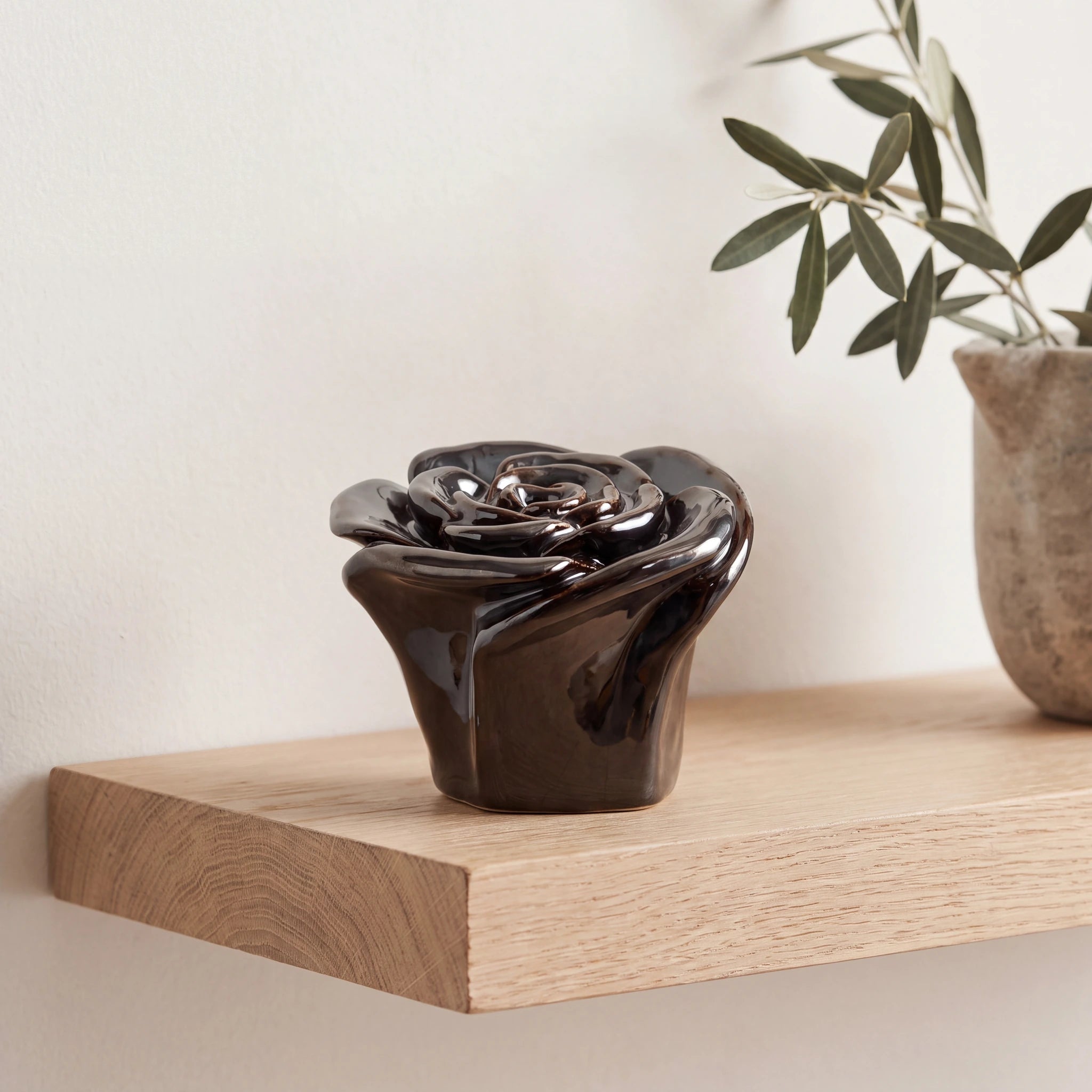 Rose-Keepsake-Urn-for-Ashes-in-Black-Oak-Shelf