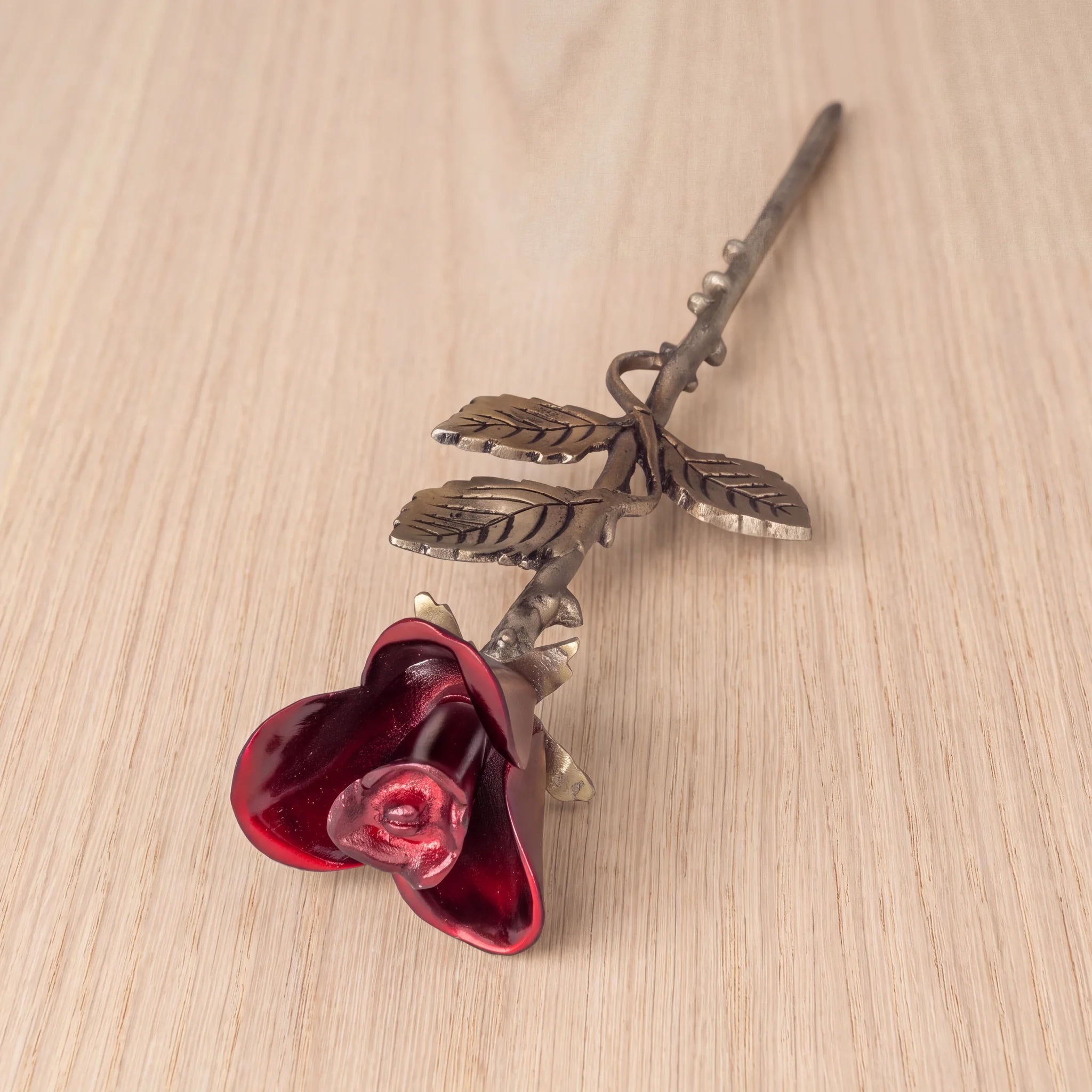 Rose-Keepsake-Urn-for-Ashes-in-Red-and-Bronze-On-Oak