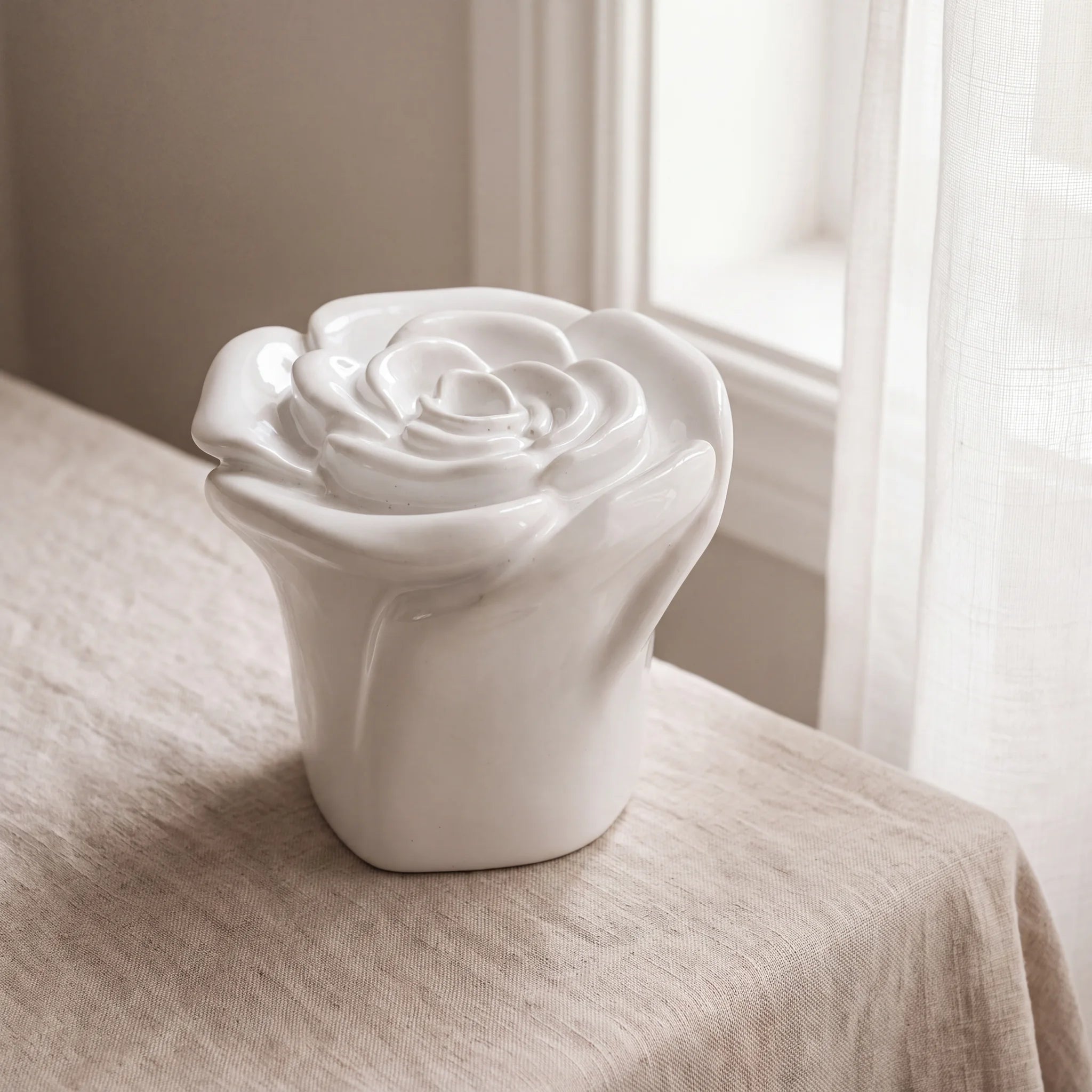 Rose-Keepsake-Urn-for-Ashes-in-White-Linen-Table