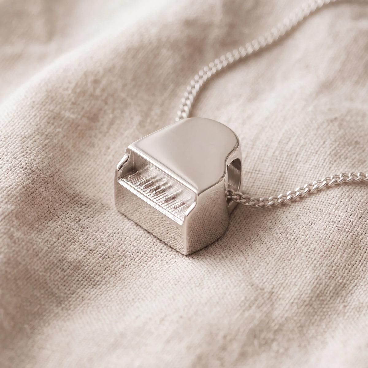 Self-fill-Grand-Piano-Memorial-Ashes-Pendant-On-Linen