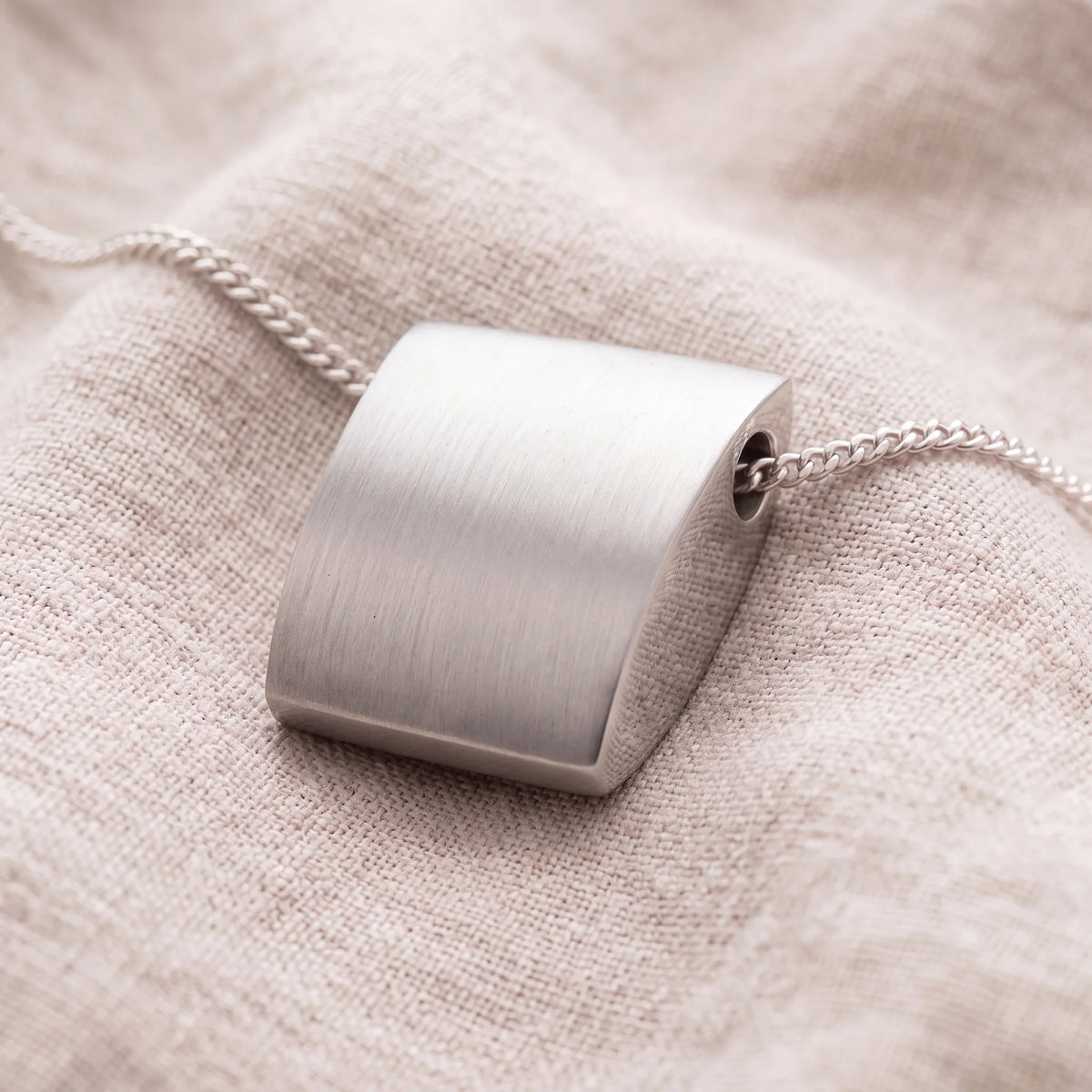 Self-fill-Horizon-Memorial-Ashes-Pendant-On-Linen