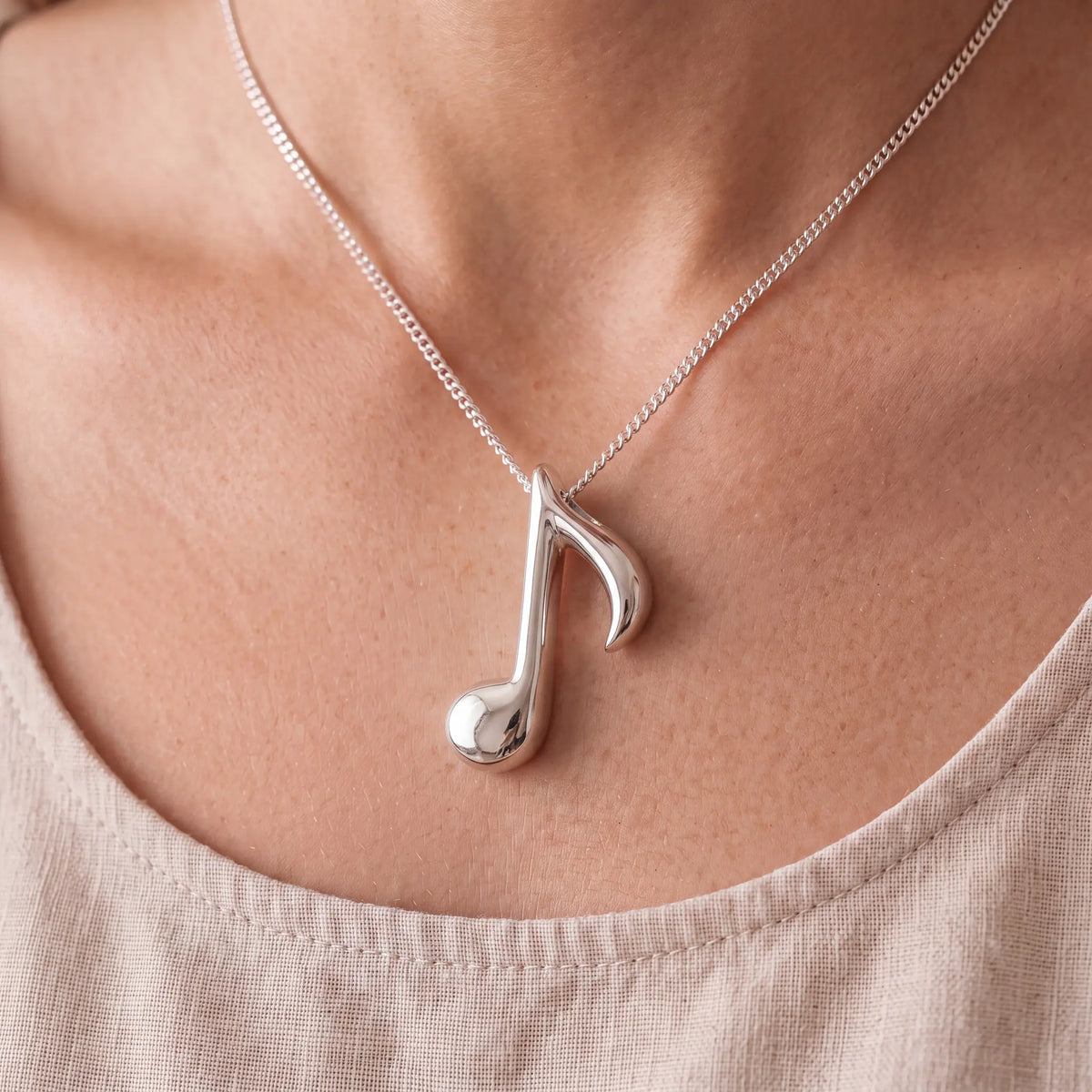Self-fill-Musical-Eighth-Note-Memorial-Ashes-Pendant-Worn