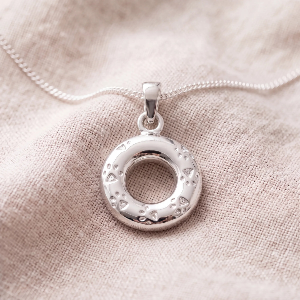 Self-fill-Paw-Print-Circle-of-Life-Memorial-Ashes-Pendant-On-Linen