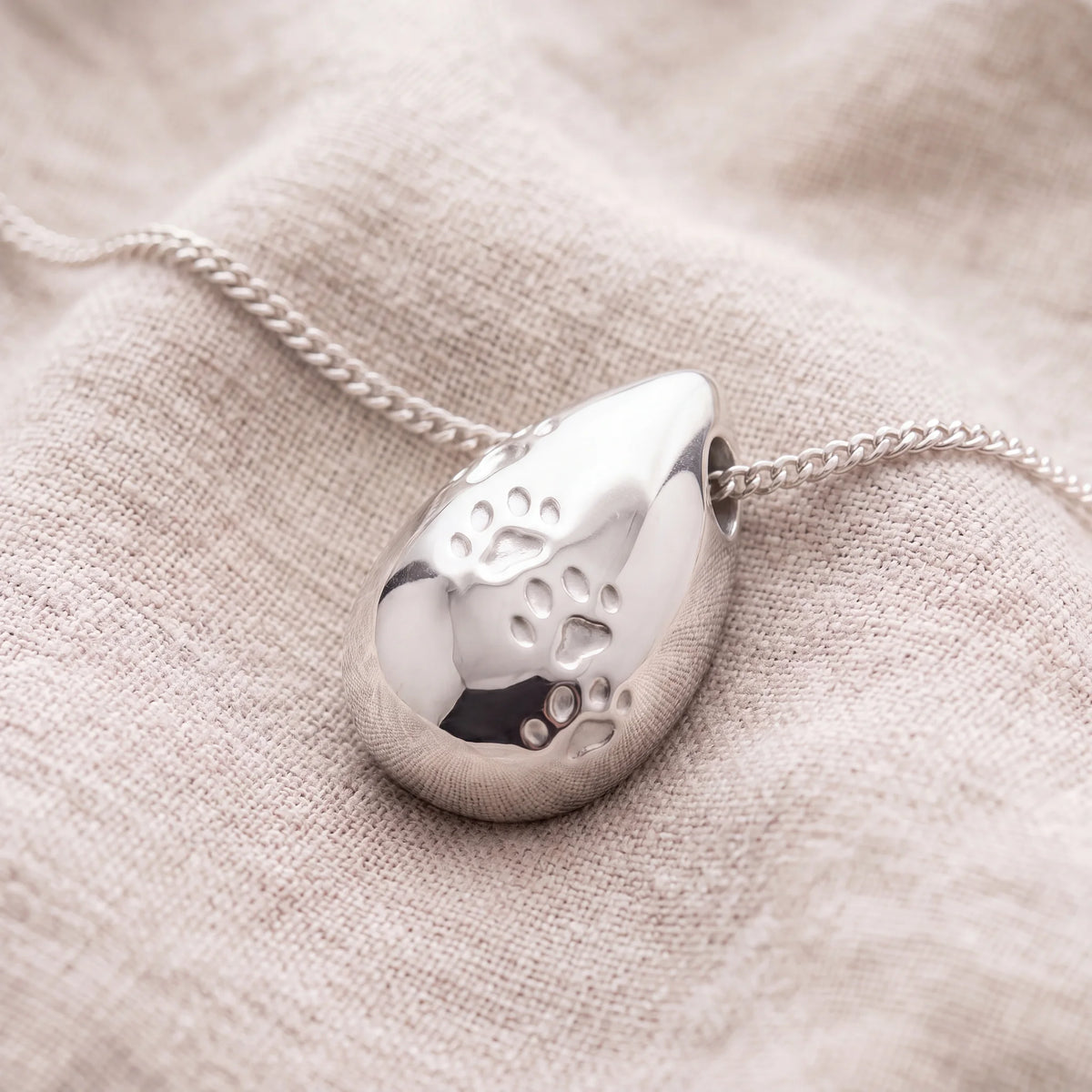 Self-fill-Paw-Prints-Drop-Memorial-Ashes-Pendant-On-Linen