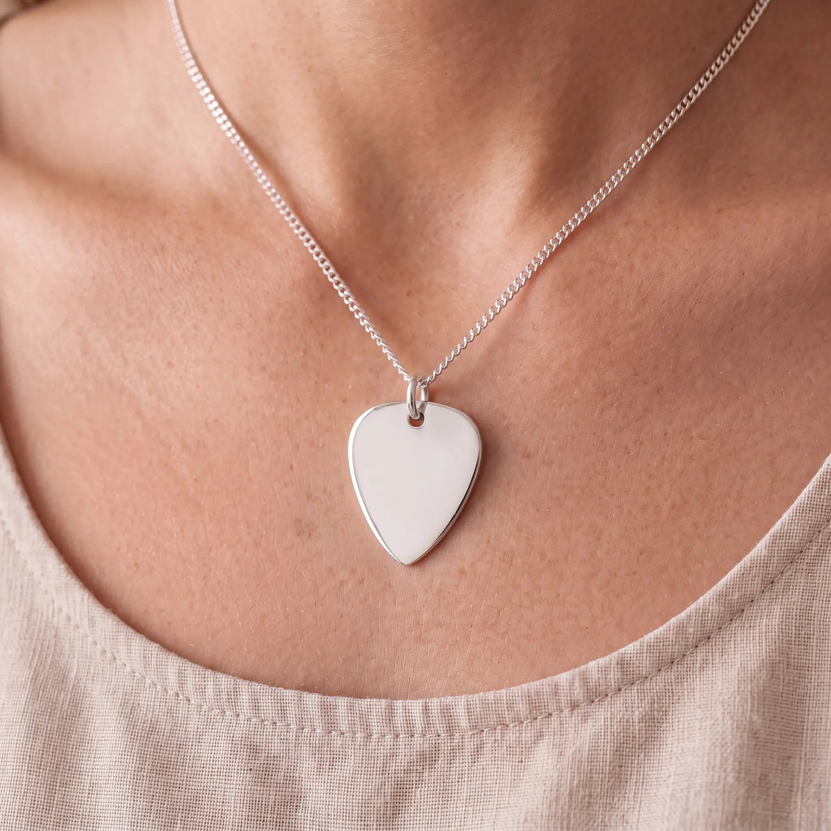 Self-fill-Plectrum-Memorial-Ashes-Pendant-Worn