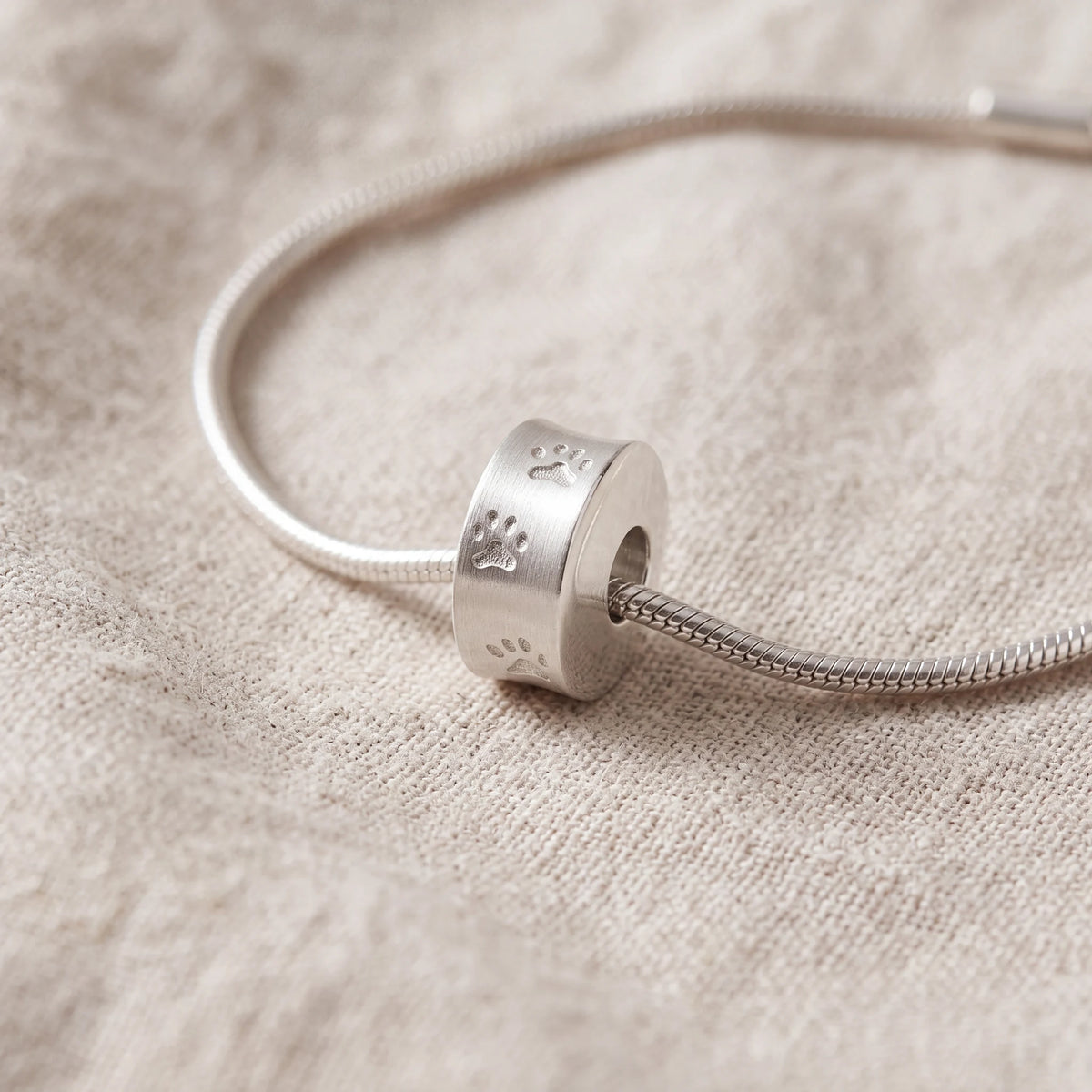 Self-fill-Round-Paw-Print-Memorial-Ashes-Charm-Bead-On-Linen