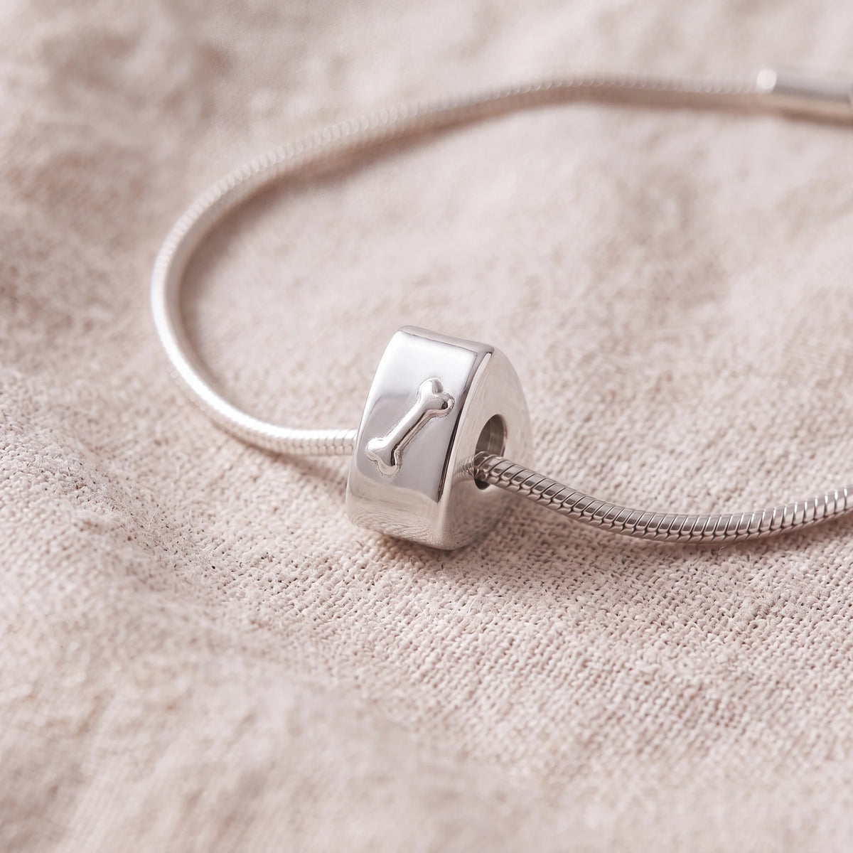 Self-fill-Triangular-Dog-Bone-Memorial-Ashes-Charm-Bead-On-Linen