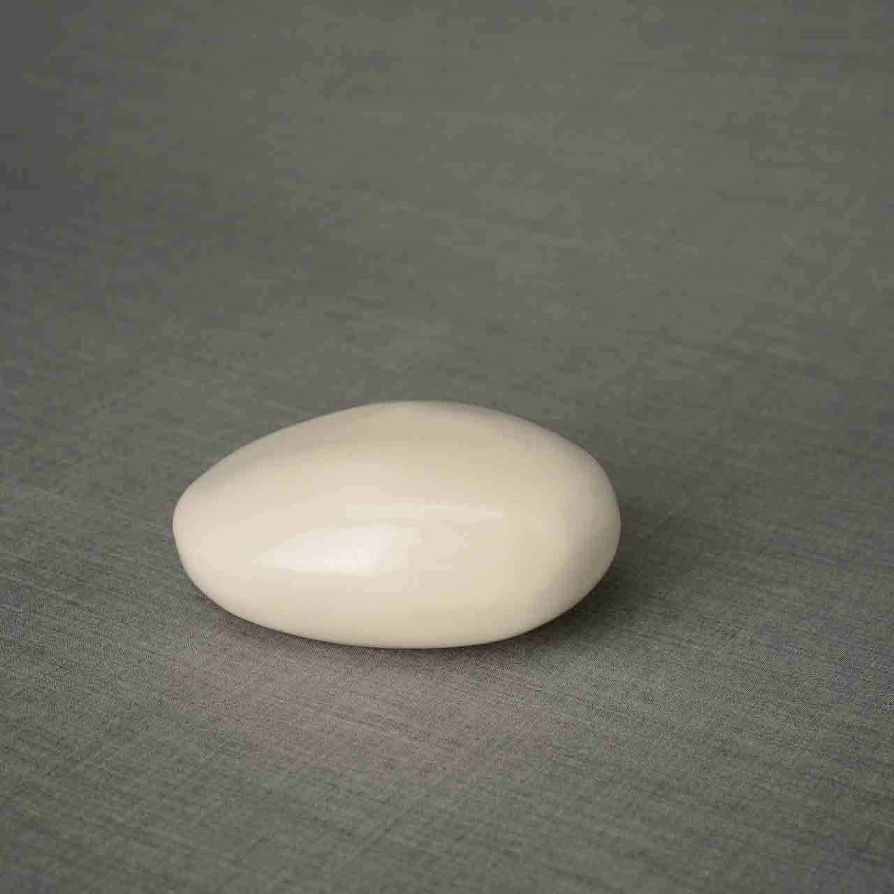 Stone Ashes Keepsake Urn in Cream Dark Background