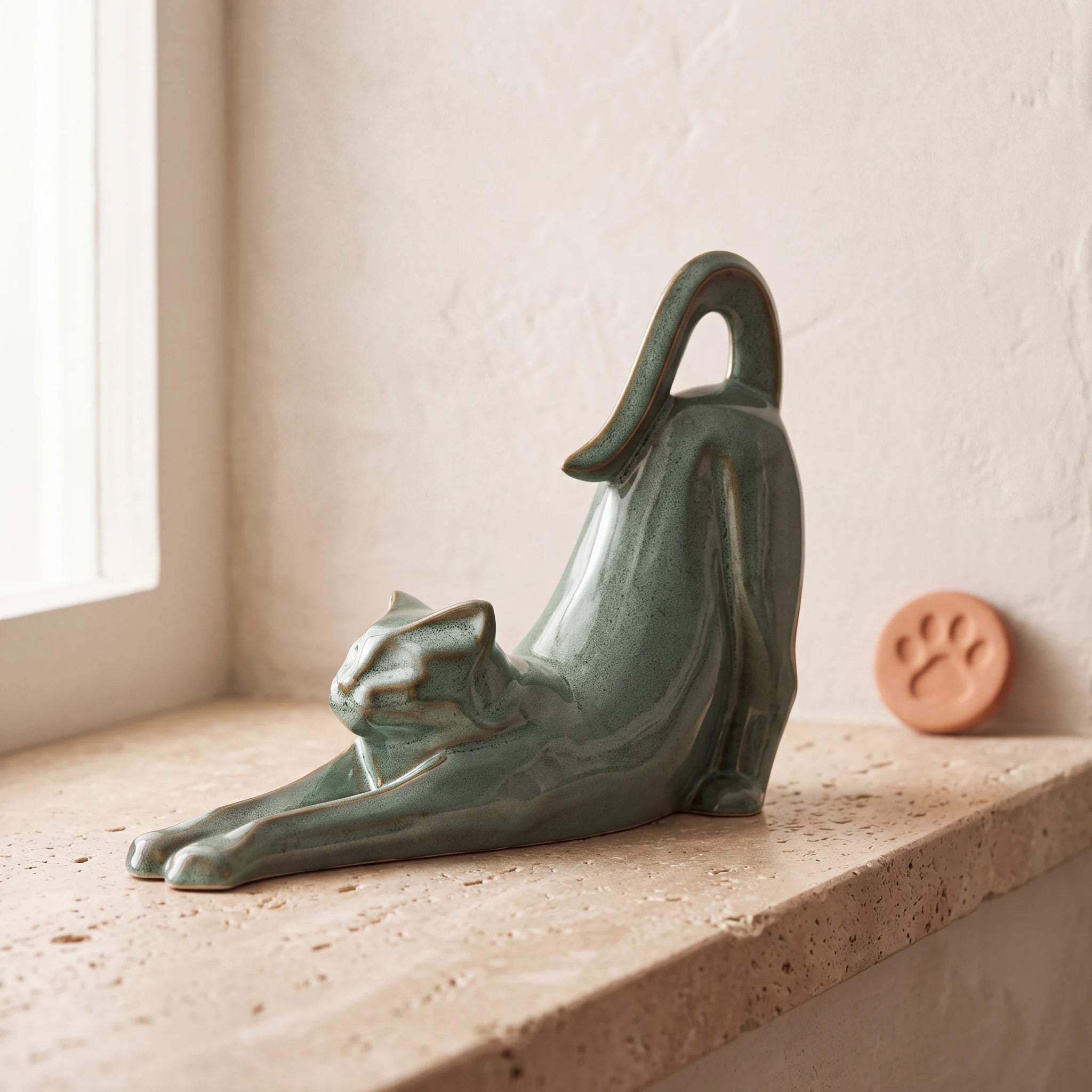 Stretching-Cat-Urn-for-Ashes-in-Oily-Green-pet_paw_token