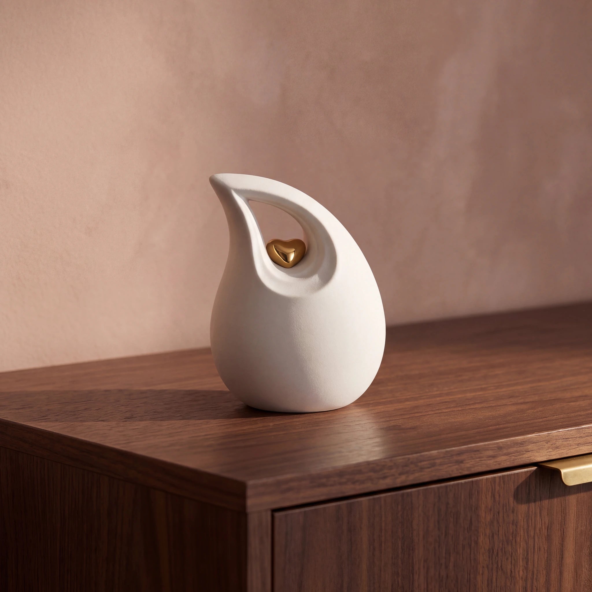 Teardrop-Heart-Small-Urn-for-Ashes-in-White-and-Gold-Walnut-Sideboard