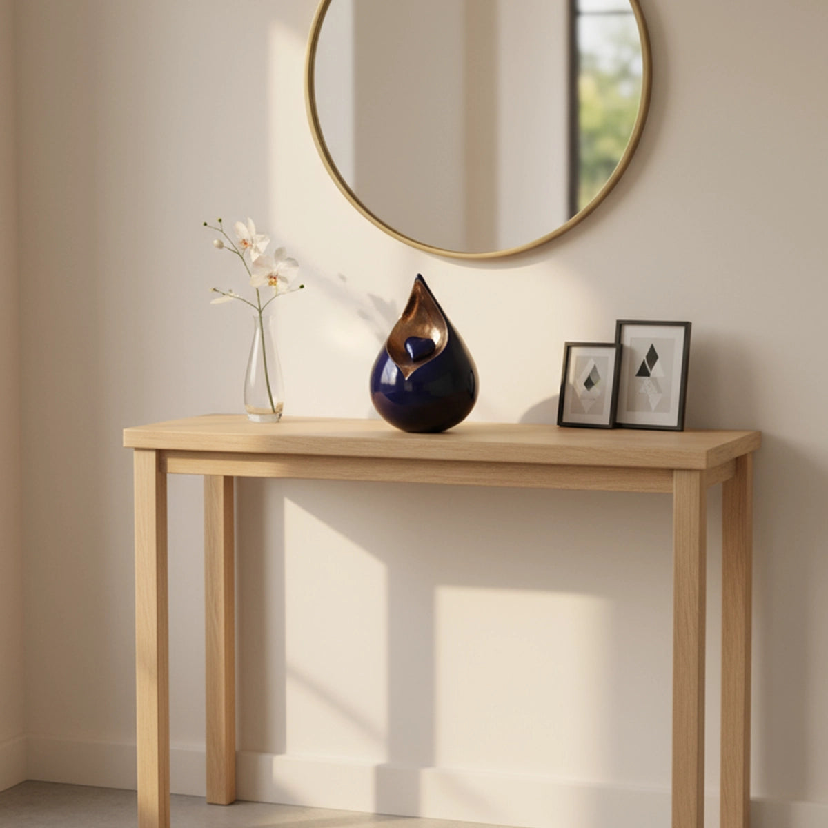 Teardrop Medium Urn with Heart for Ashes in Cobalt Blue and Gold on Hallway Table
