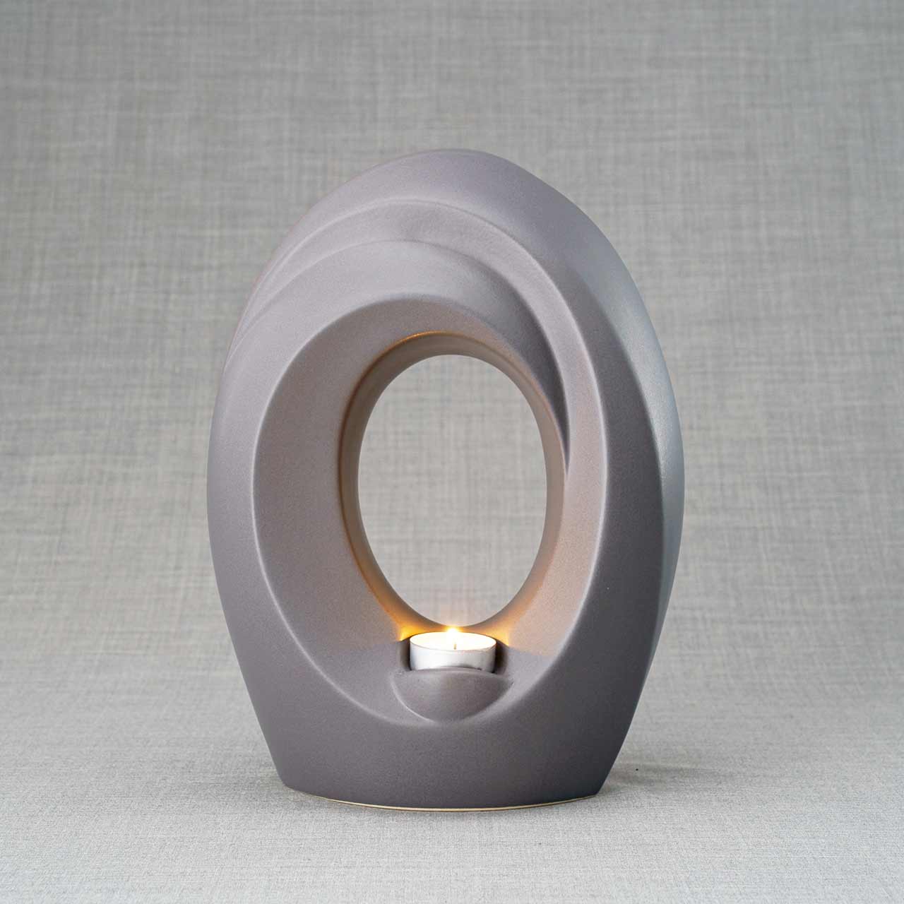 The Passage Adult Cremation Urn for Ashes Matte Grey Back View Dark Background