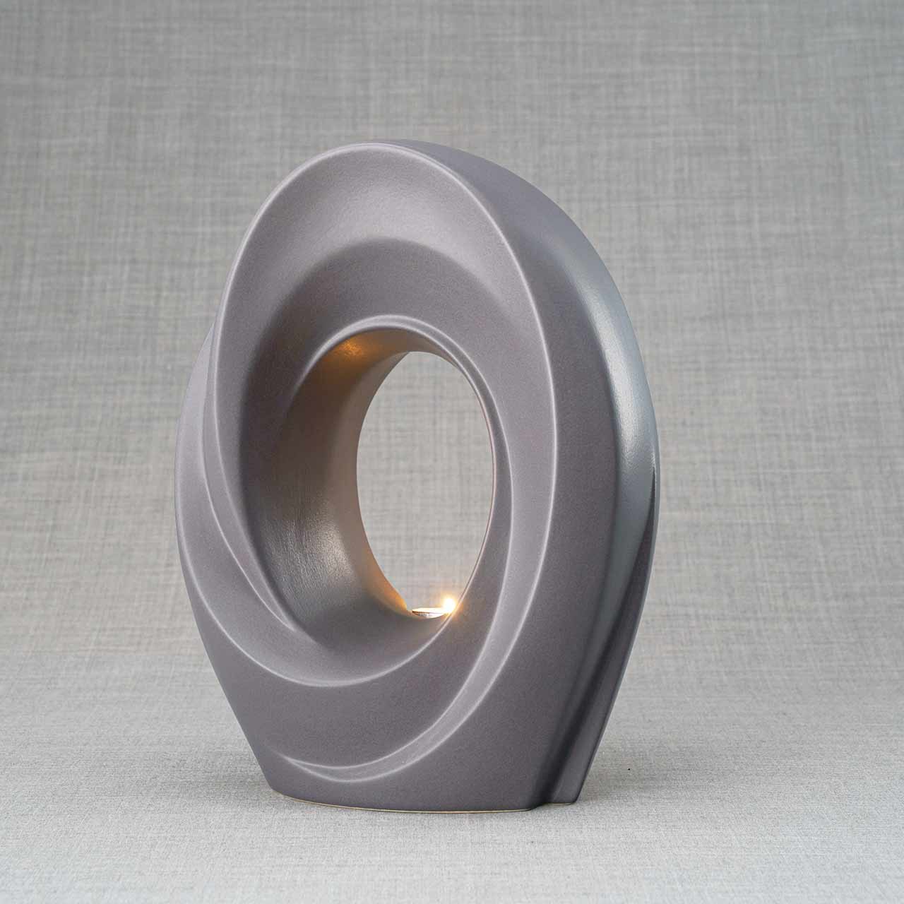 The Passage Adult Cremation Urn for Ashes Matte Grey Left View Dark Background