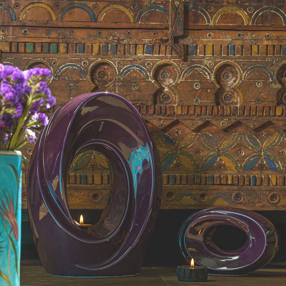 The Passage Adult Urn for Ashes Purple by Wall in Home