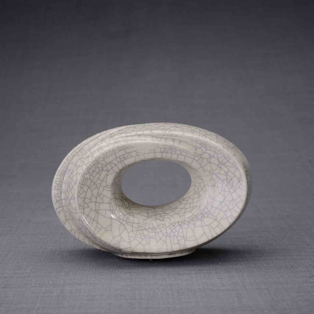 The Passage Ashes Keepsake Urn in Crackle Glaze Front Facing Dark Background