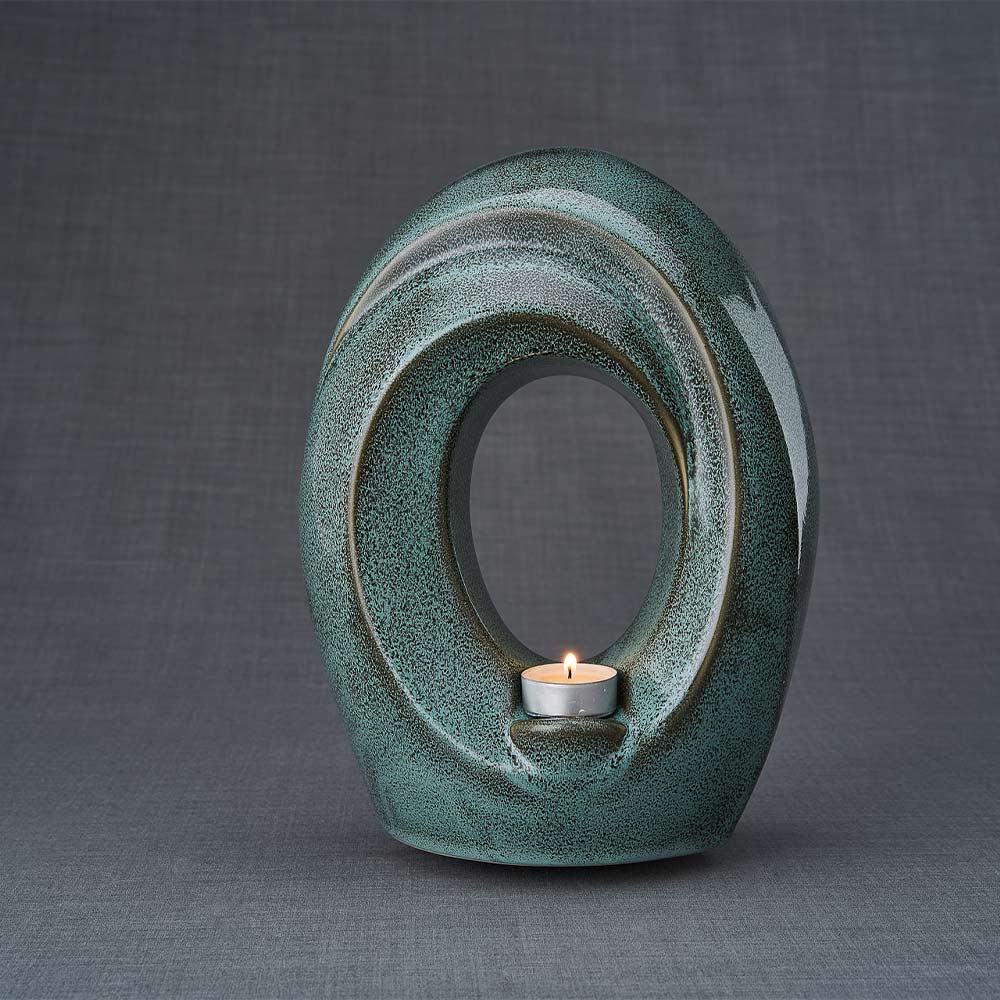 The Passage Cremation Urn for Ashes Oily Green Rear View Dark Background