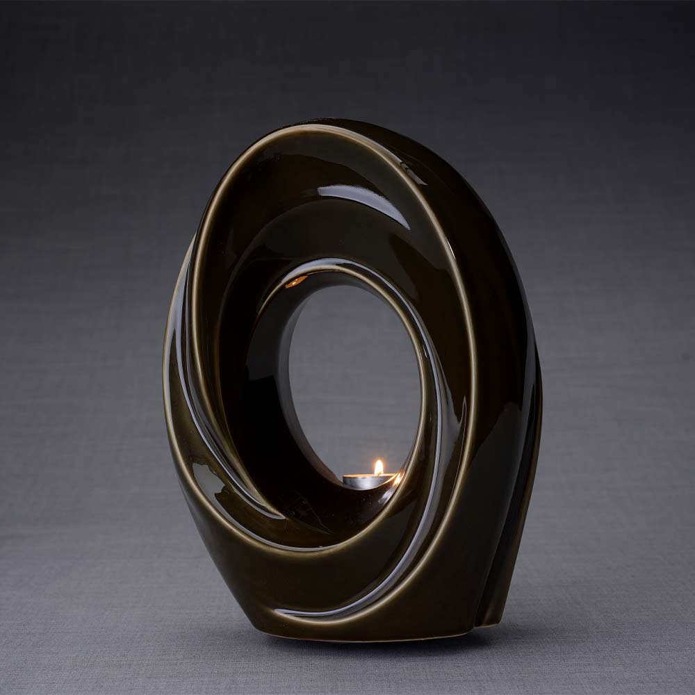 The Passage Cremation Urn for Ashes in Oily Brown Turned Left Dark Background