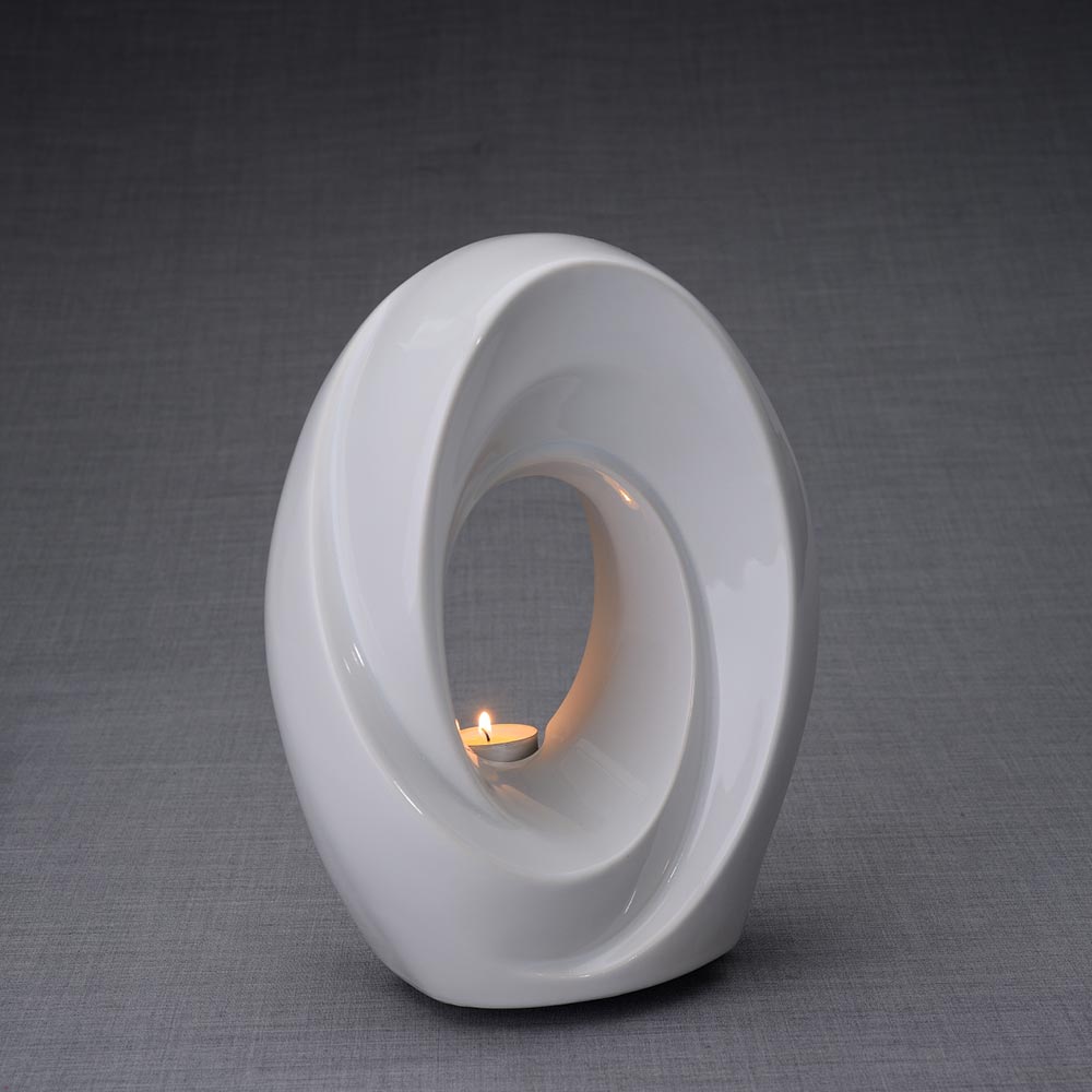 The Passage Cremation Urn for Ashes in White Facing Right Dark Background