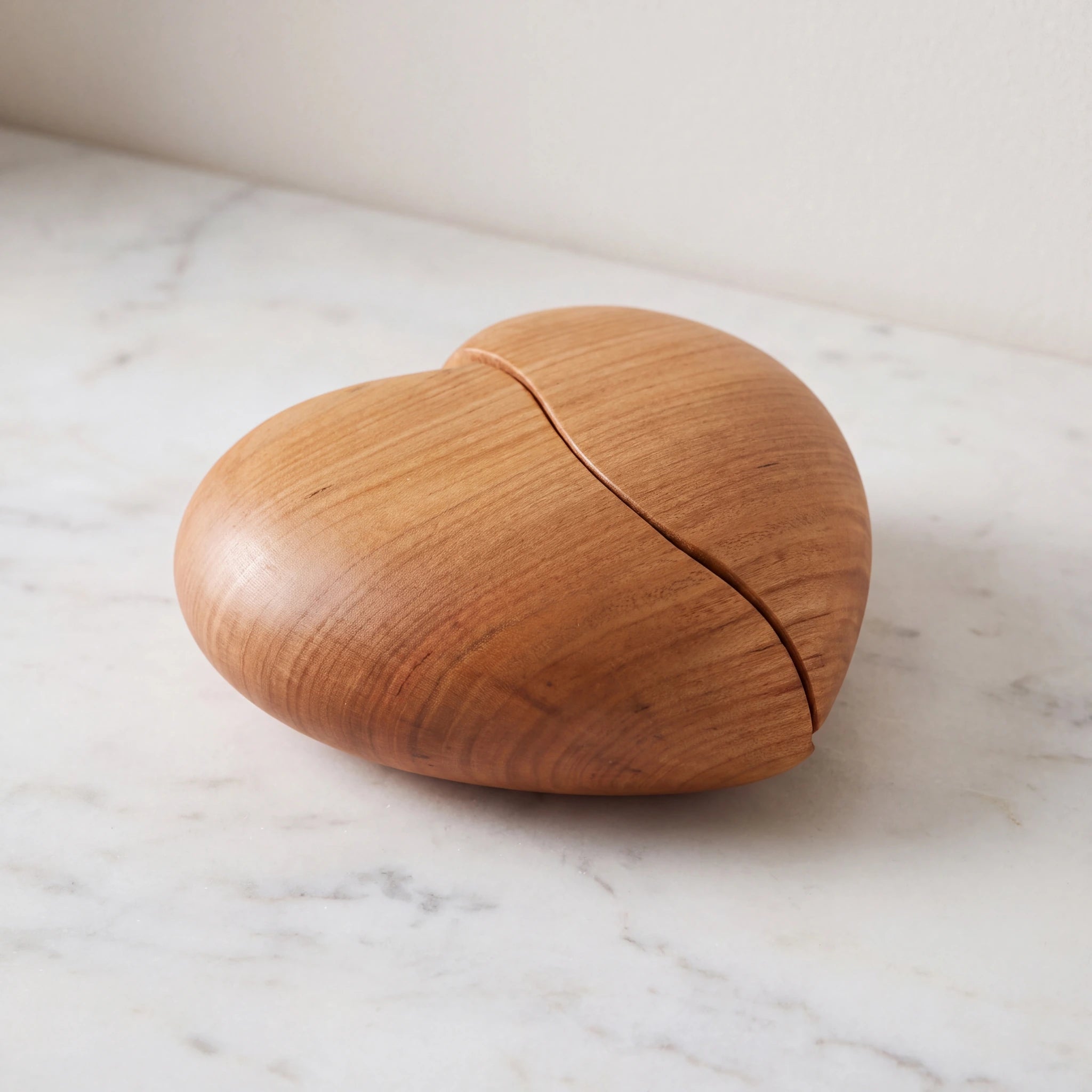 Unity-Cherry-Wood-Heart-Keepsake-Urn-for-Ashes-On-Marble