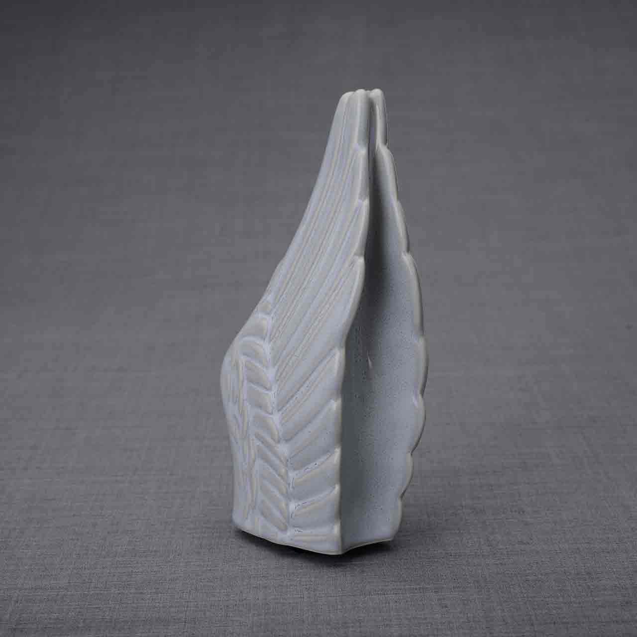 Wings Ashes Keepsake Urn in Grey Dark Background