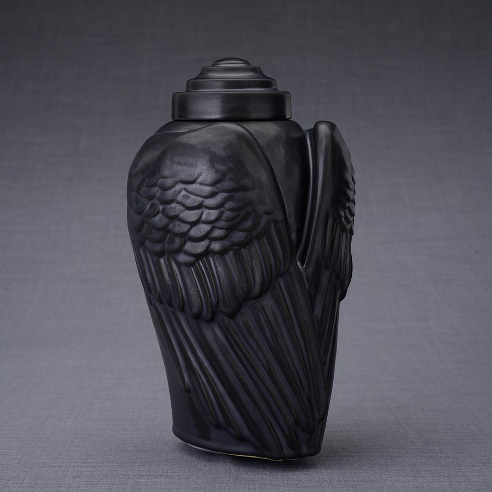 Wings Cremation Urn for Ashes in Matte Black Turned Right Dark Background