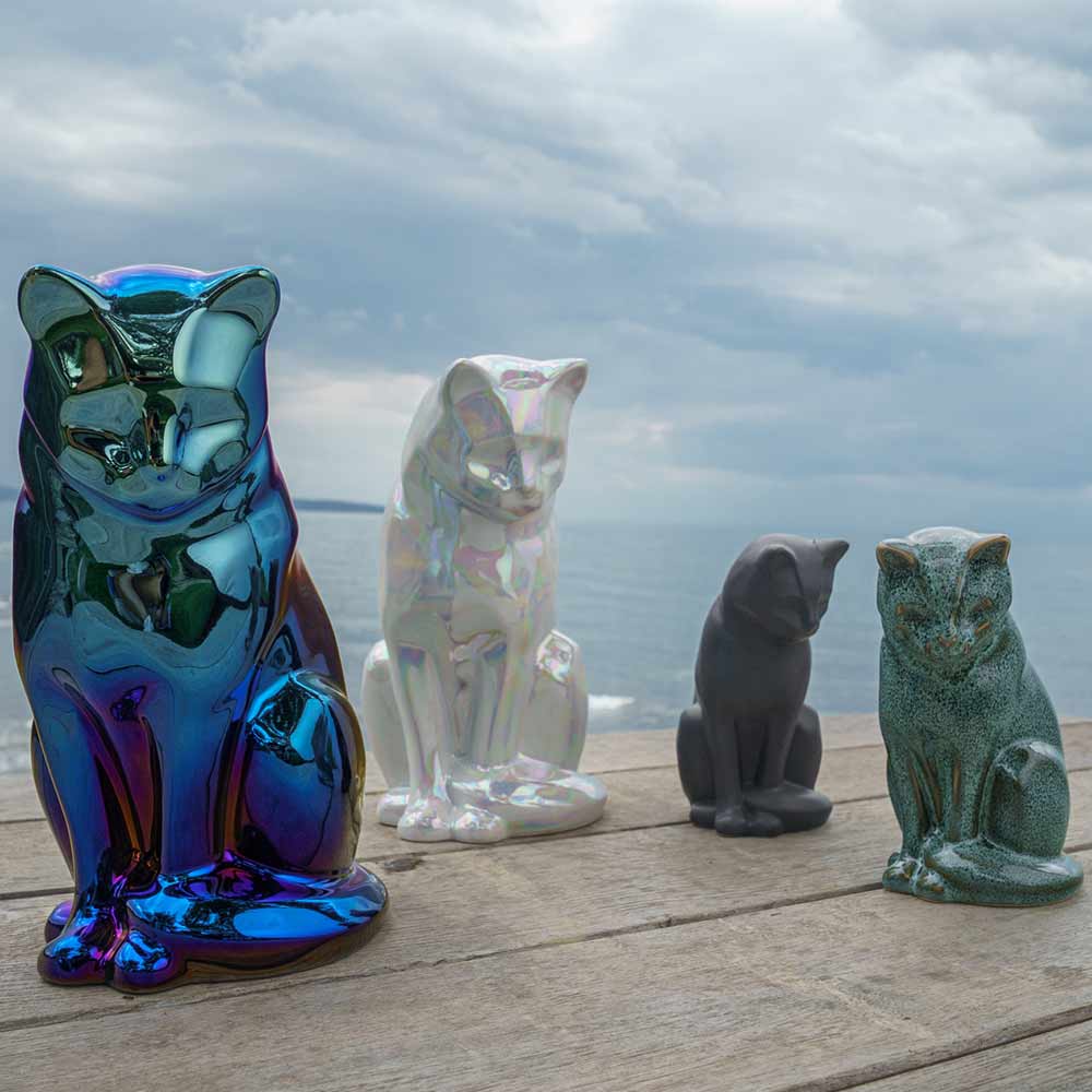 cat urns for ashes outside near ocean charcoal