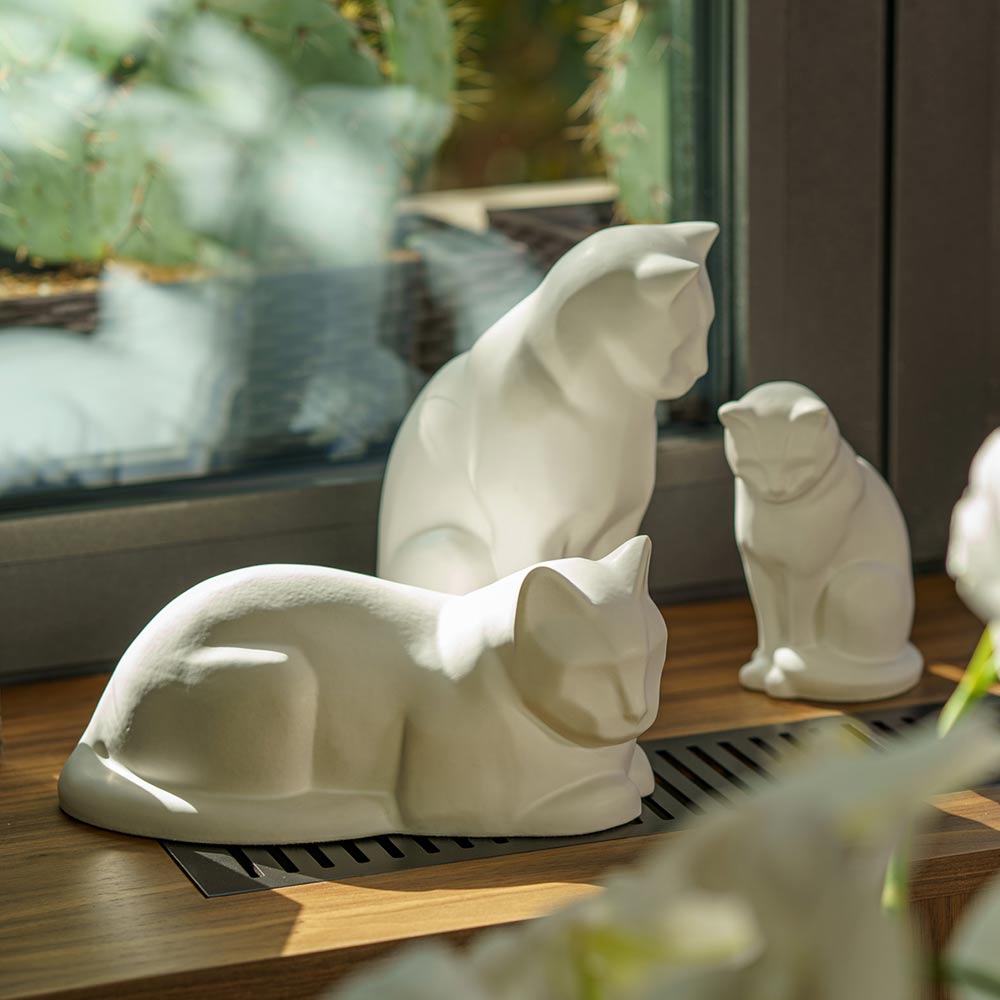 Matte White Cat Urns On Window Ledge Left Angle
