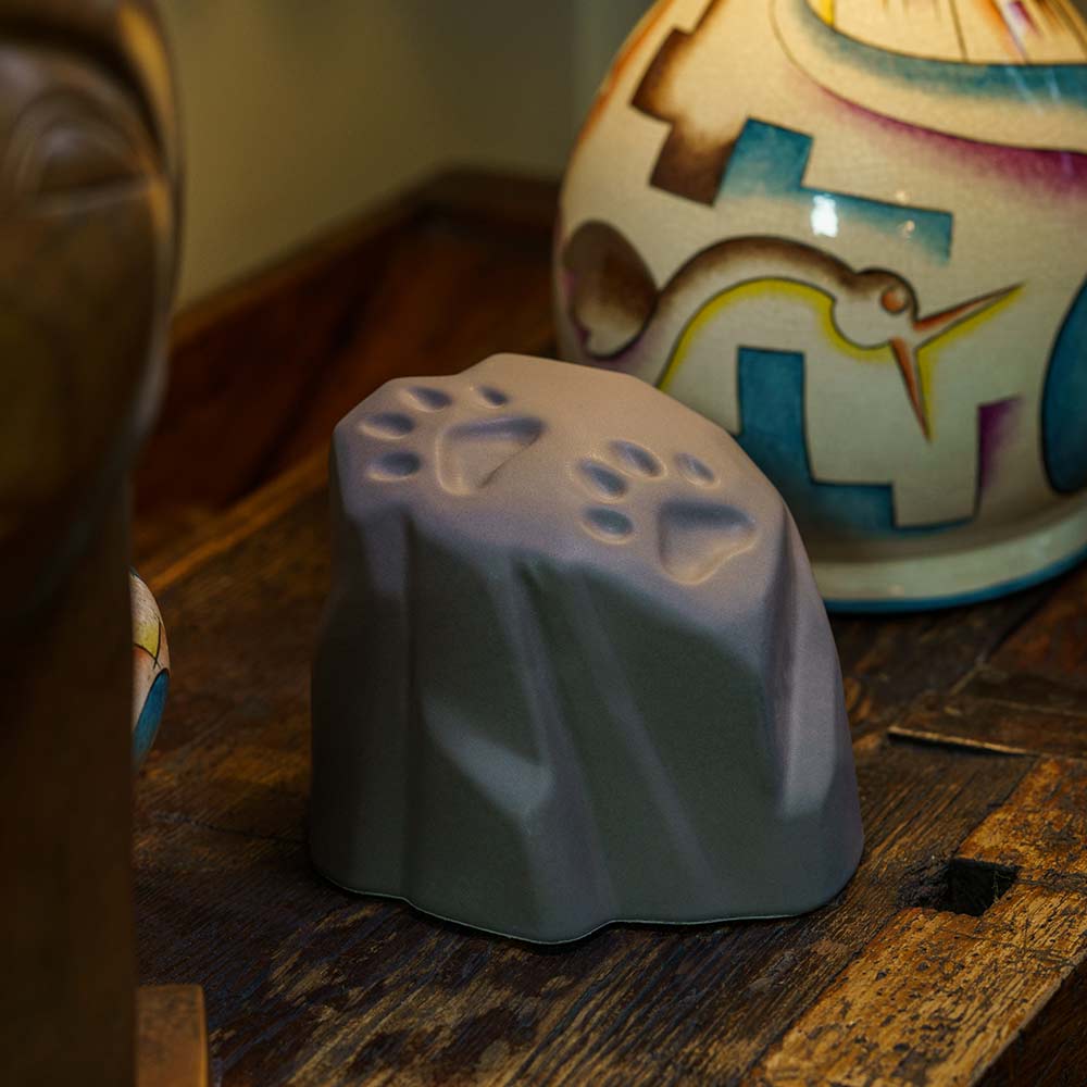 Paw Prints Dog Urn For Ashes Matte Grey On Shelf