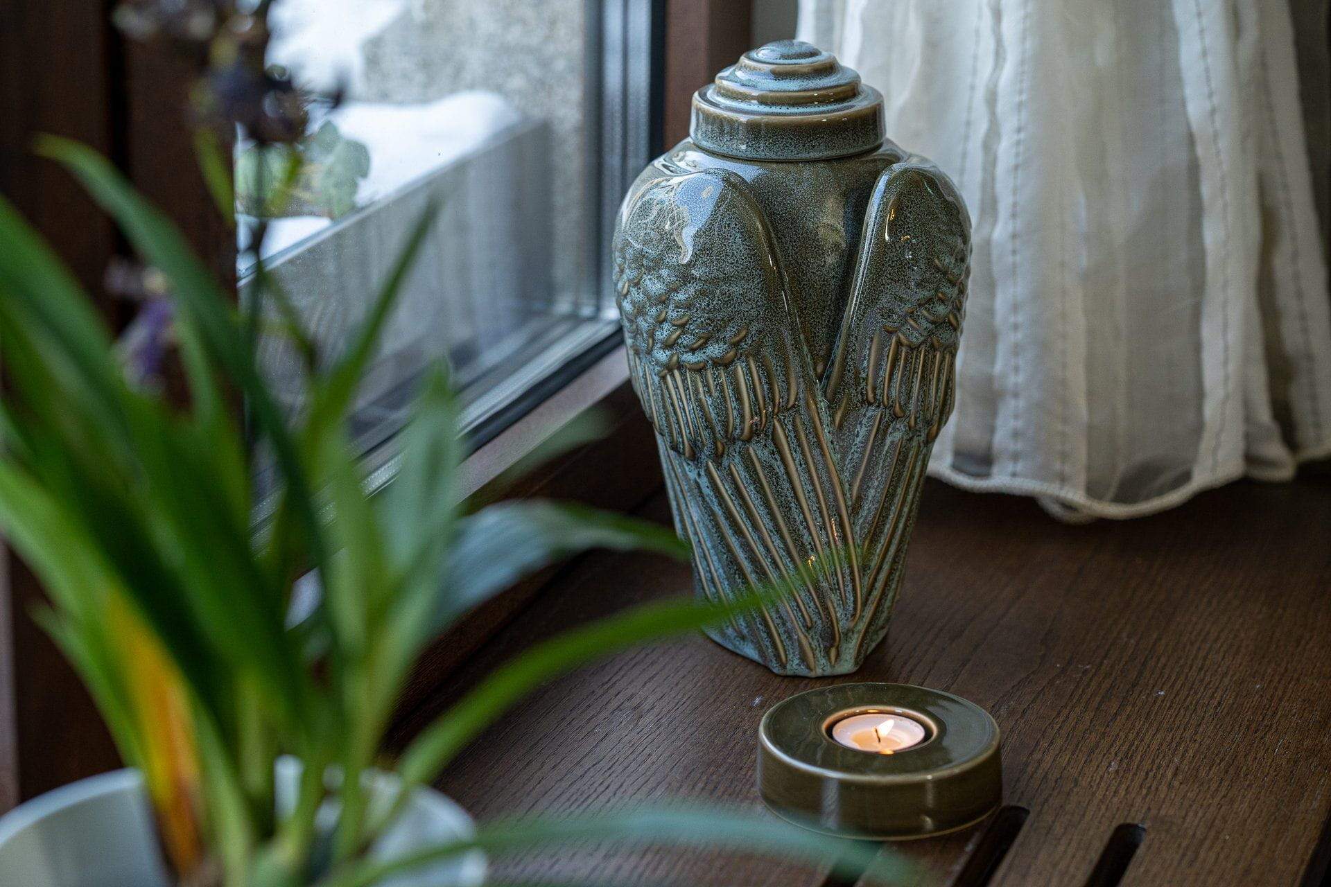 Caleo Candle Holder for Cremation Urns in Oily Green