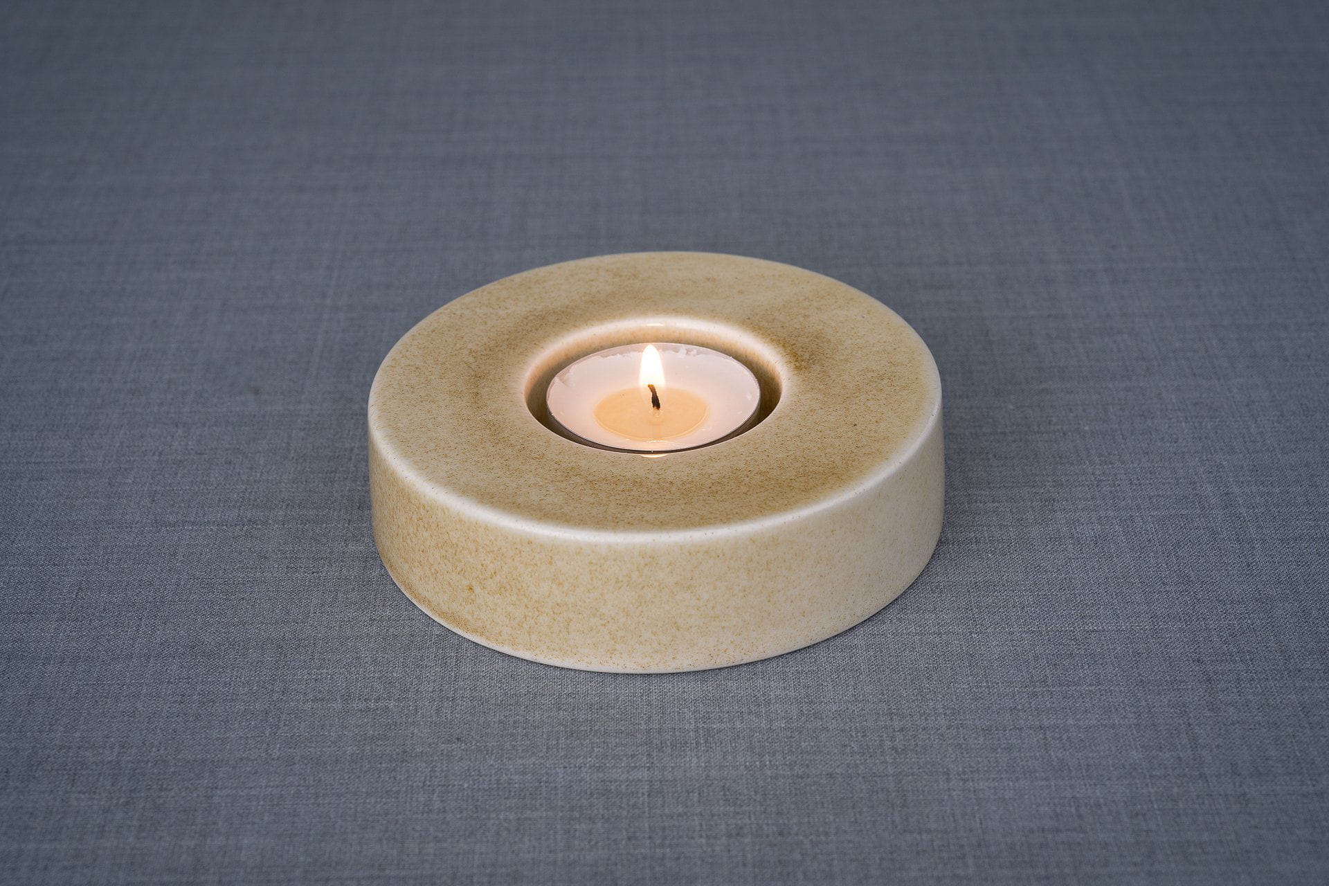Caleo Candle Holder for Cremation Urns in Light Sand