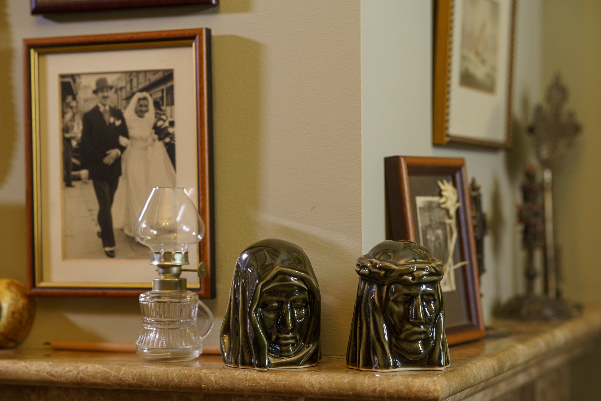The Holy Mother Mini Urn for Ashes in Oily Green