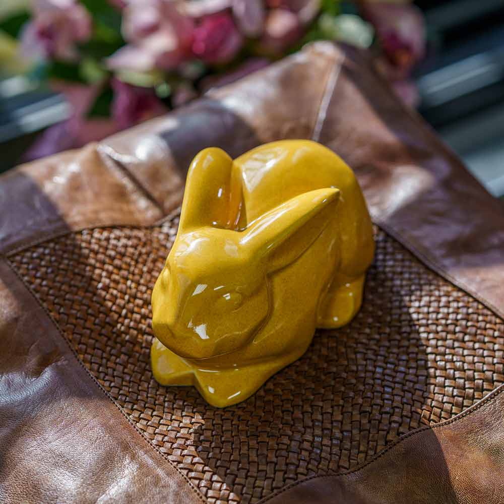 Rabbit Urn For Ashes Amber On Cushion