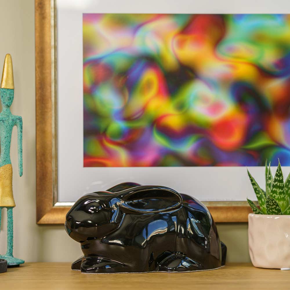Rabbit Urn For Ashes Glossy Black On Shelf Left