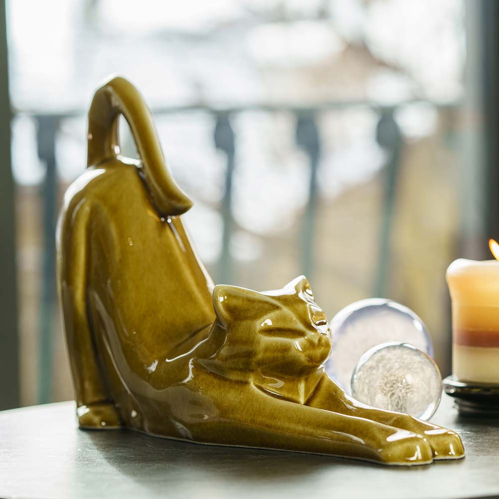 Stretching Cat Urn For Ashes Dark Sand On Table Front Right Straight On
