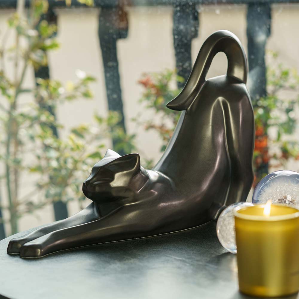 Stretching Cat Urn For Ashes Matte Black On Table Front Left