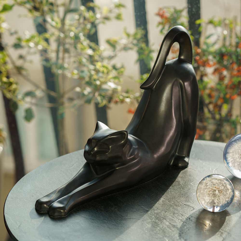 Stretching Cat Urn For Ashes Matte Black On Table Top Left