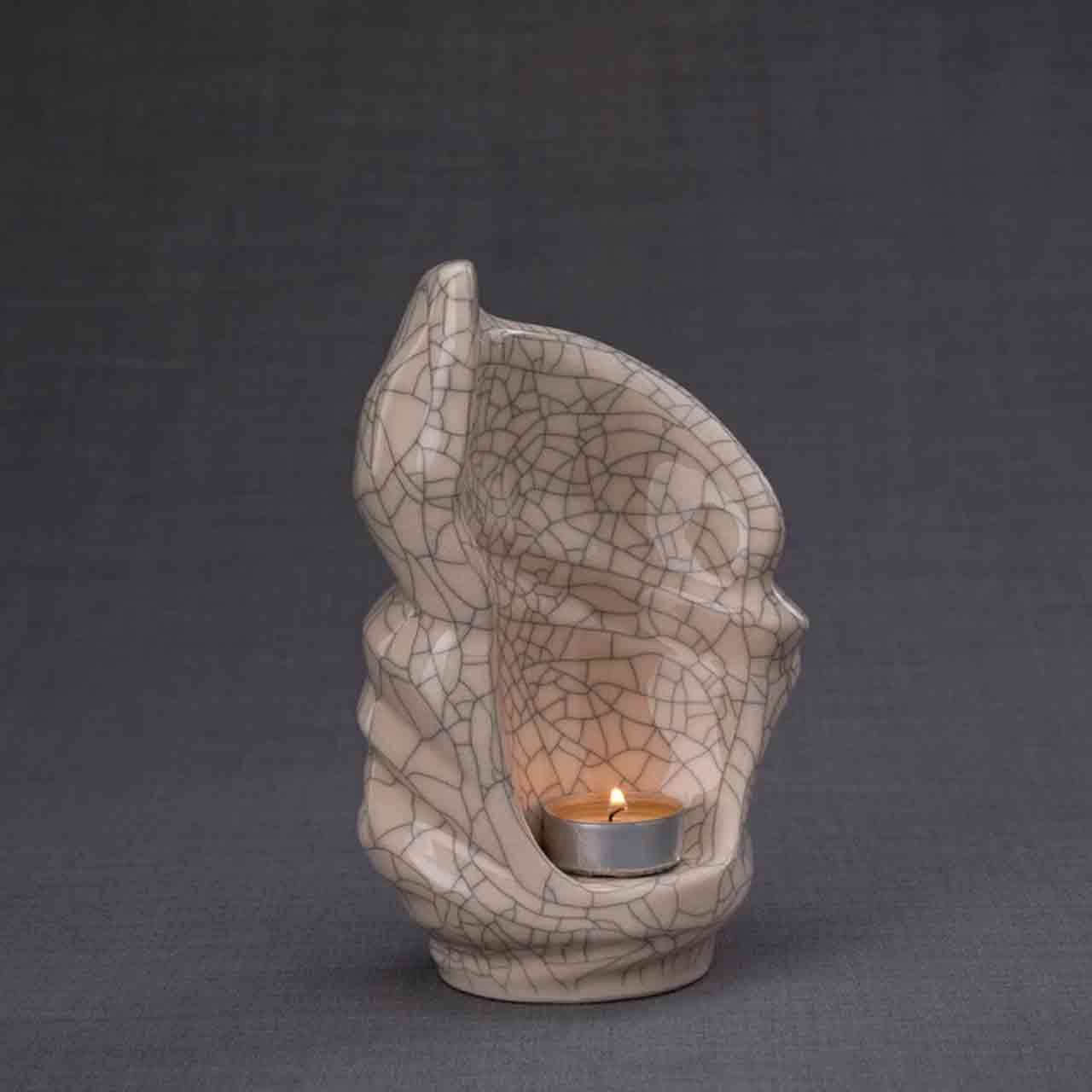 Light Ashes Keepsake Urn in Crackle Glaze Dark Background Facing Right
