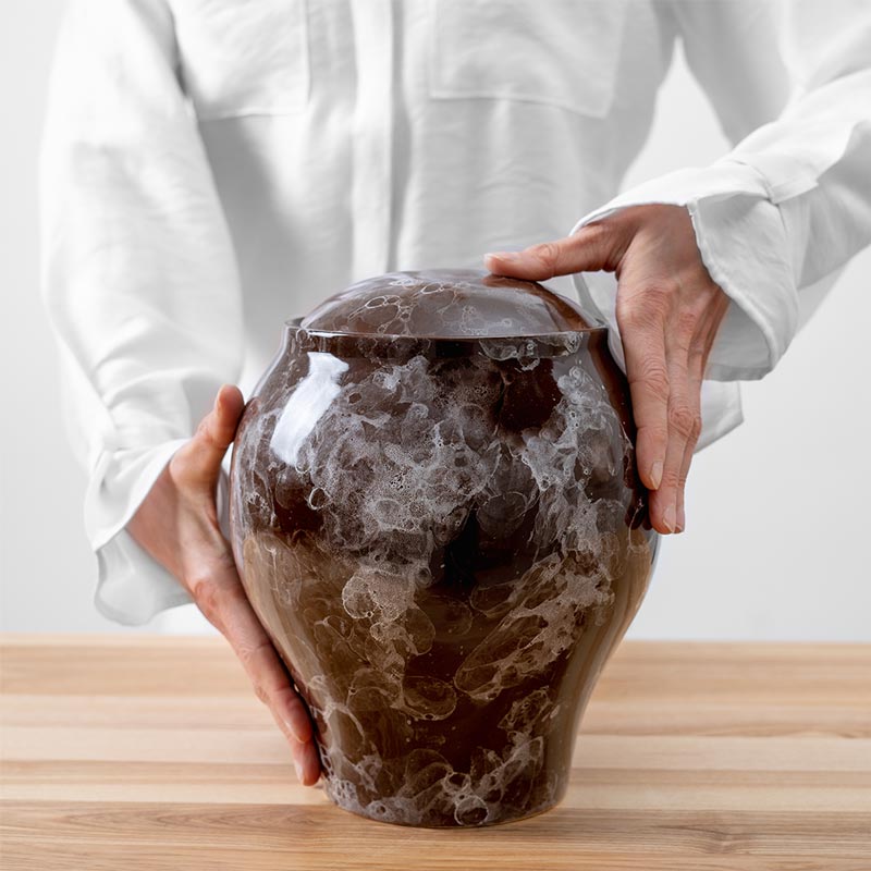 Splash Classic Cremation Urn for Ashes Brown Being Held