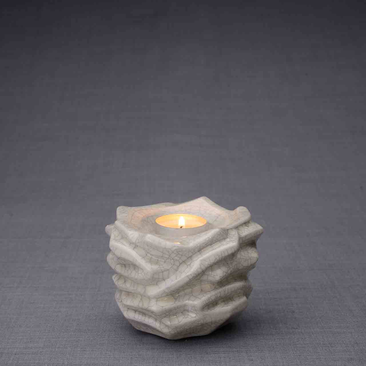 The Christ Ashes Keepsake Urn in Crackle Glaze Dark Background