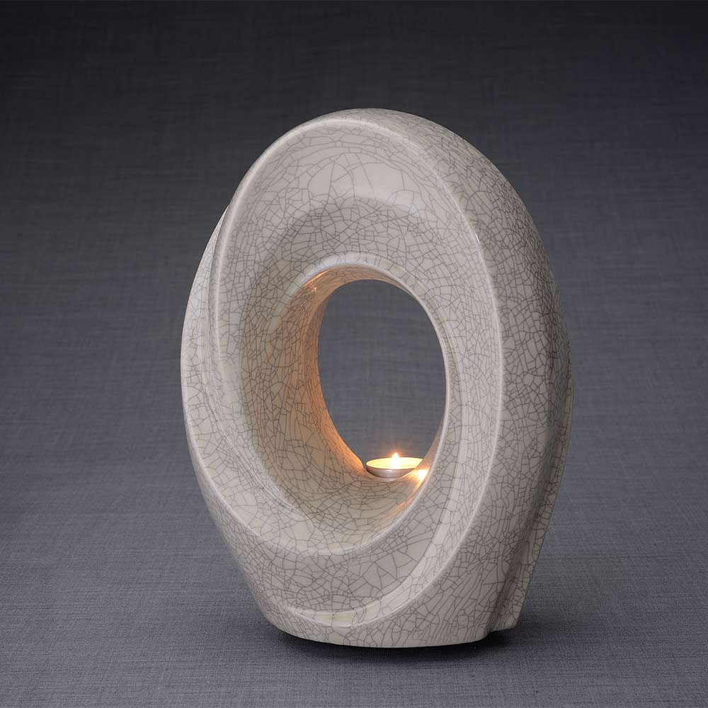 The Passage Cremation Urn for Ashes in Crackle Glaze Turned Left Dark Background