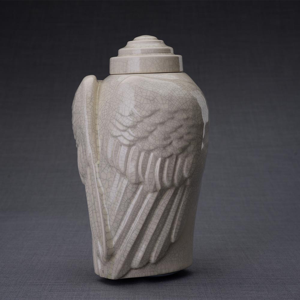 Wings Cremation Urn for Ashes in Crackle Glaze Turned Left Dark Background